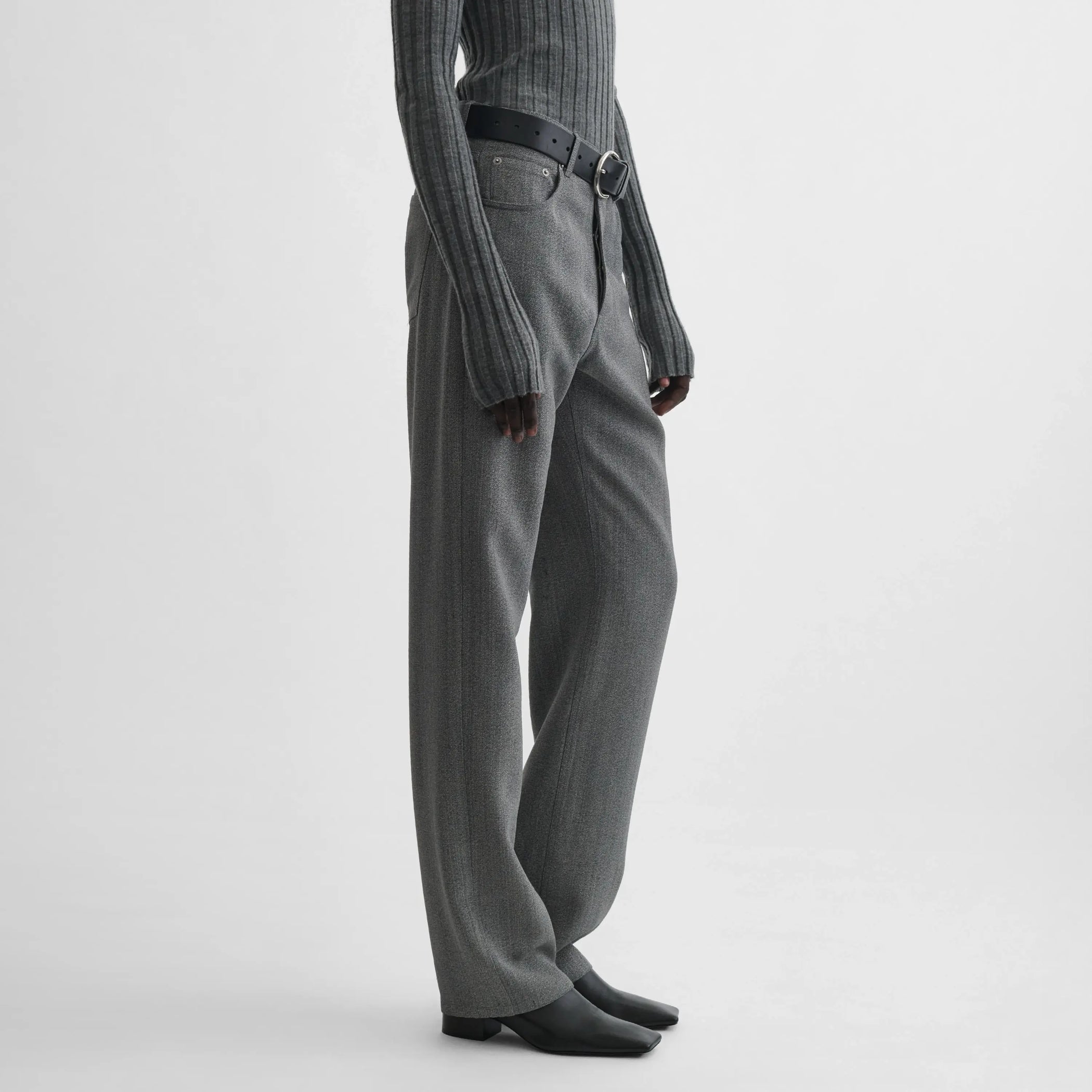 Side view of model wearing classic jeans in mist