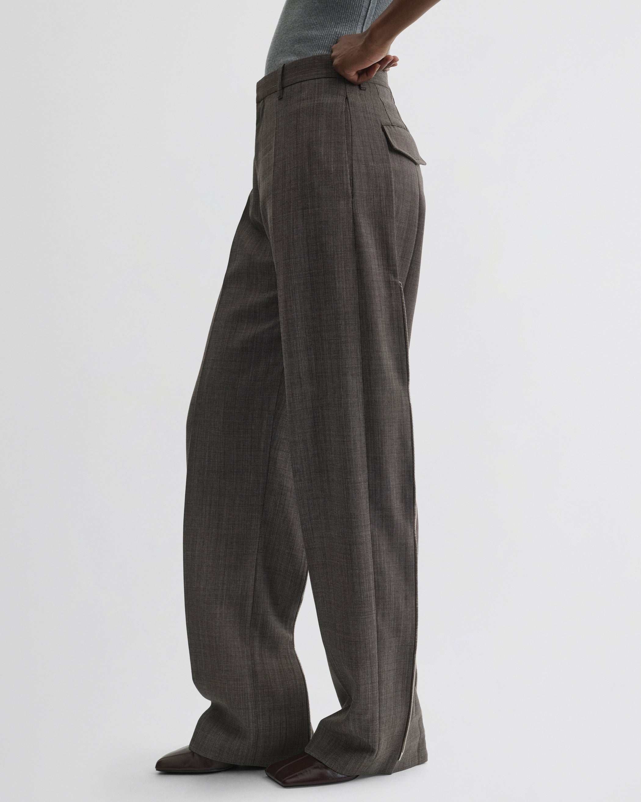 Side view of Split Zip Trousers in white dark brown wool