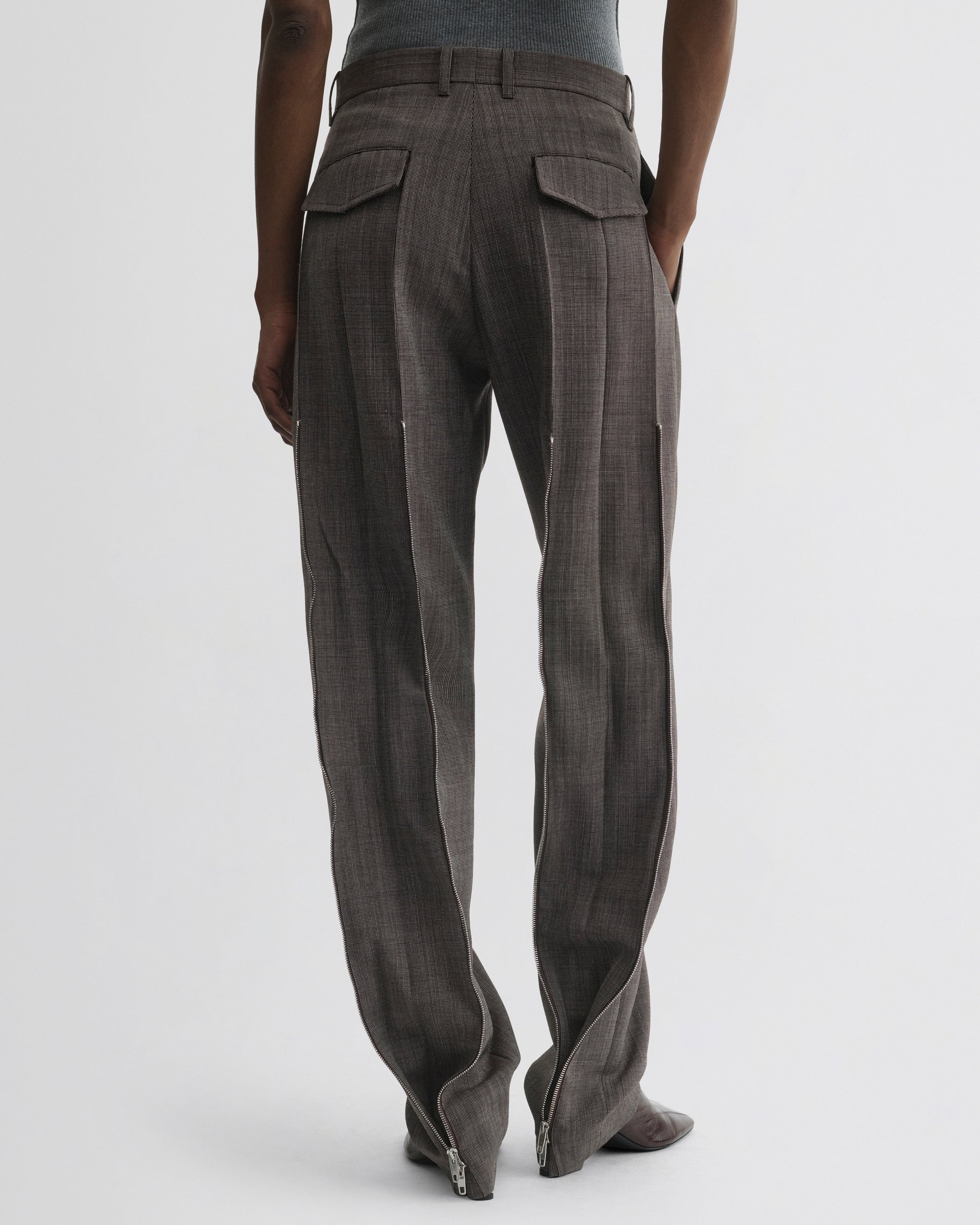 Back view of Split Zip Trousers in white dark brown wool