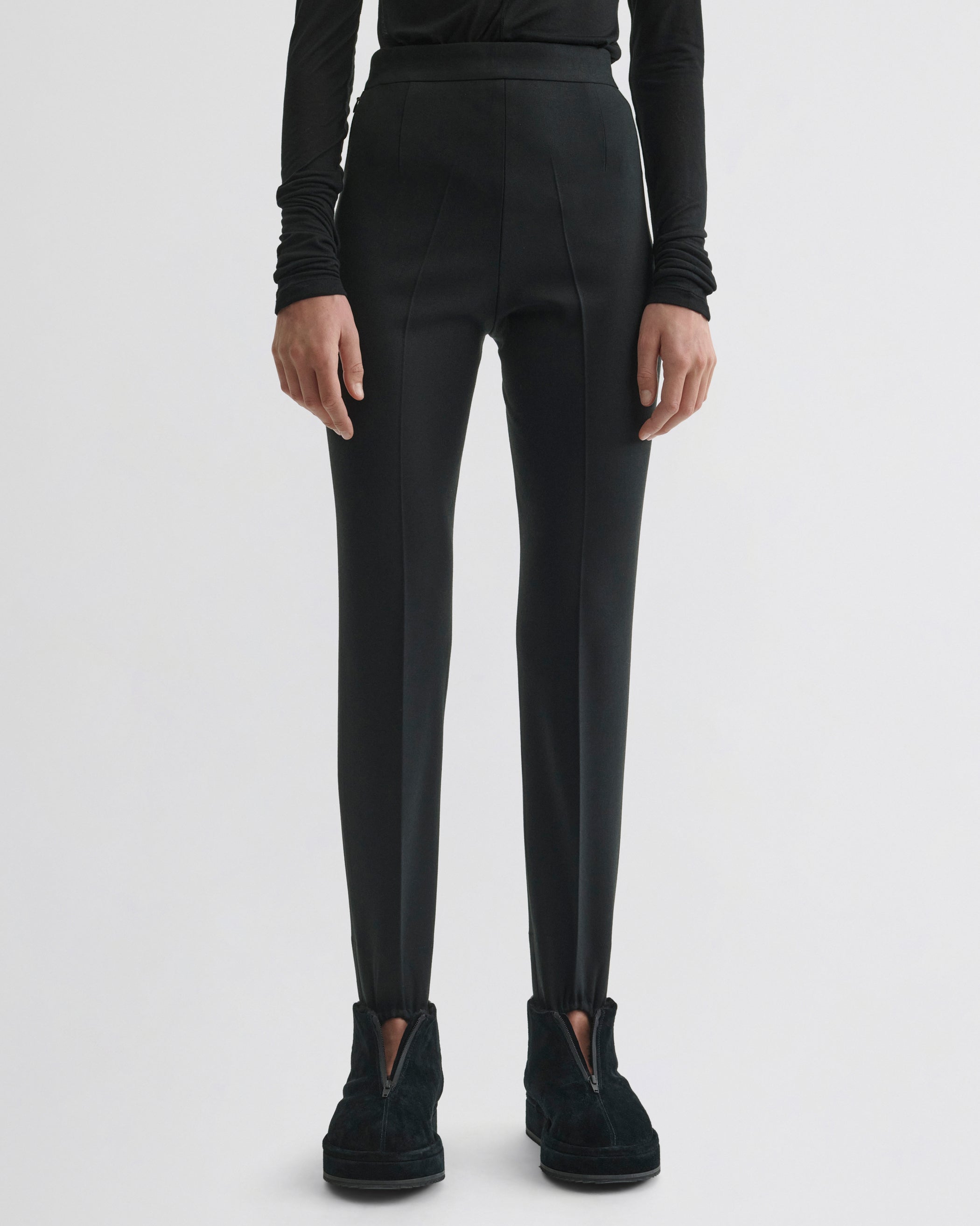 Front view of Stirrup Trousers in black wool