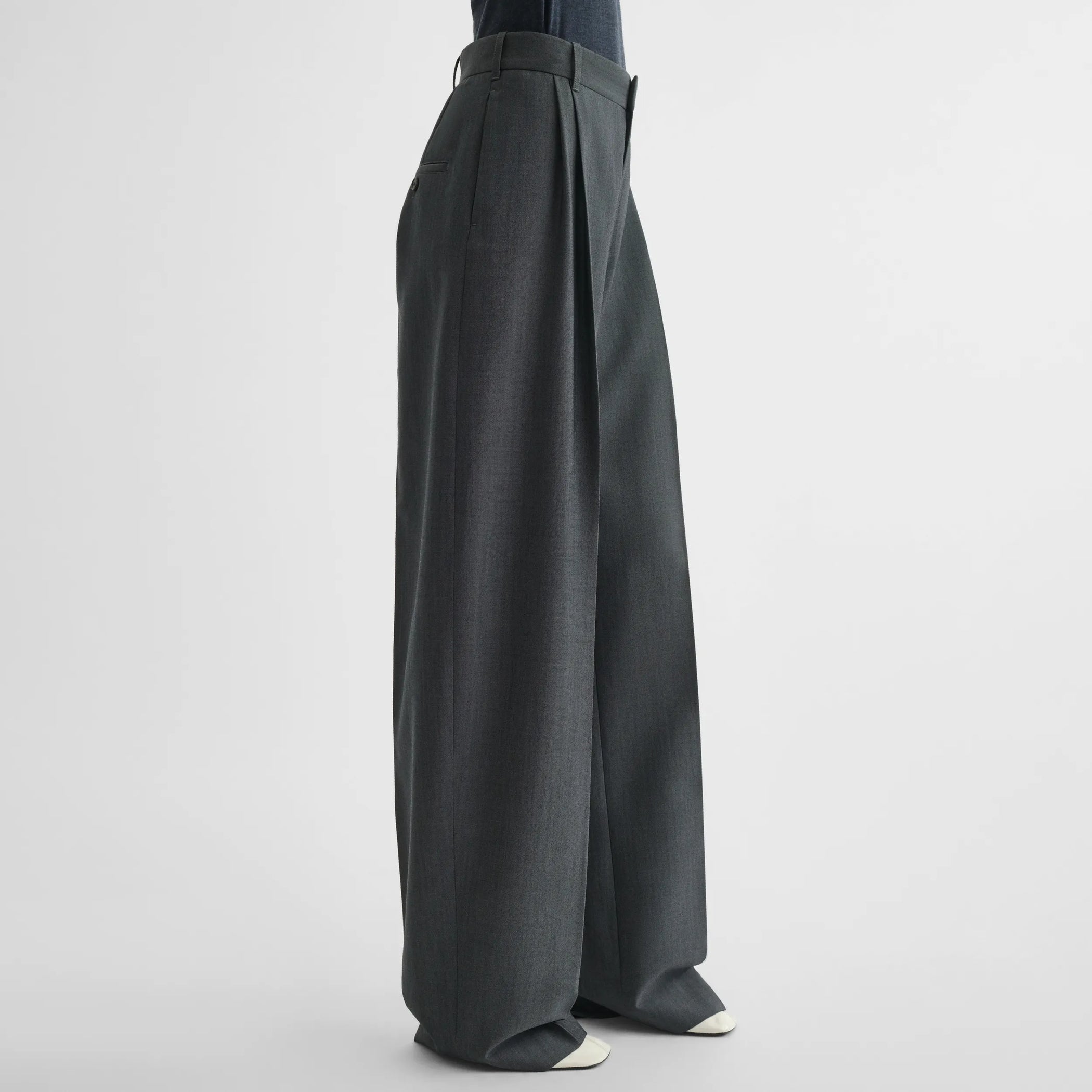 Side view of double pleat trousers in grey-melange wool