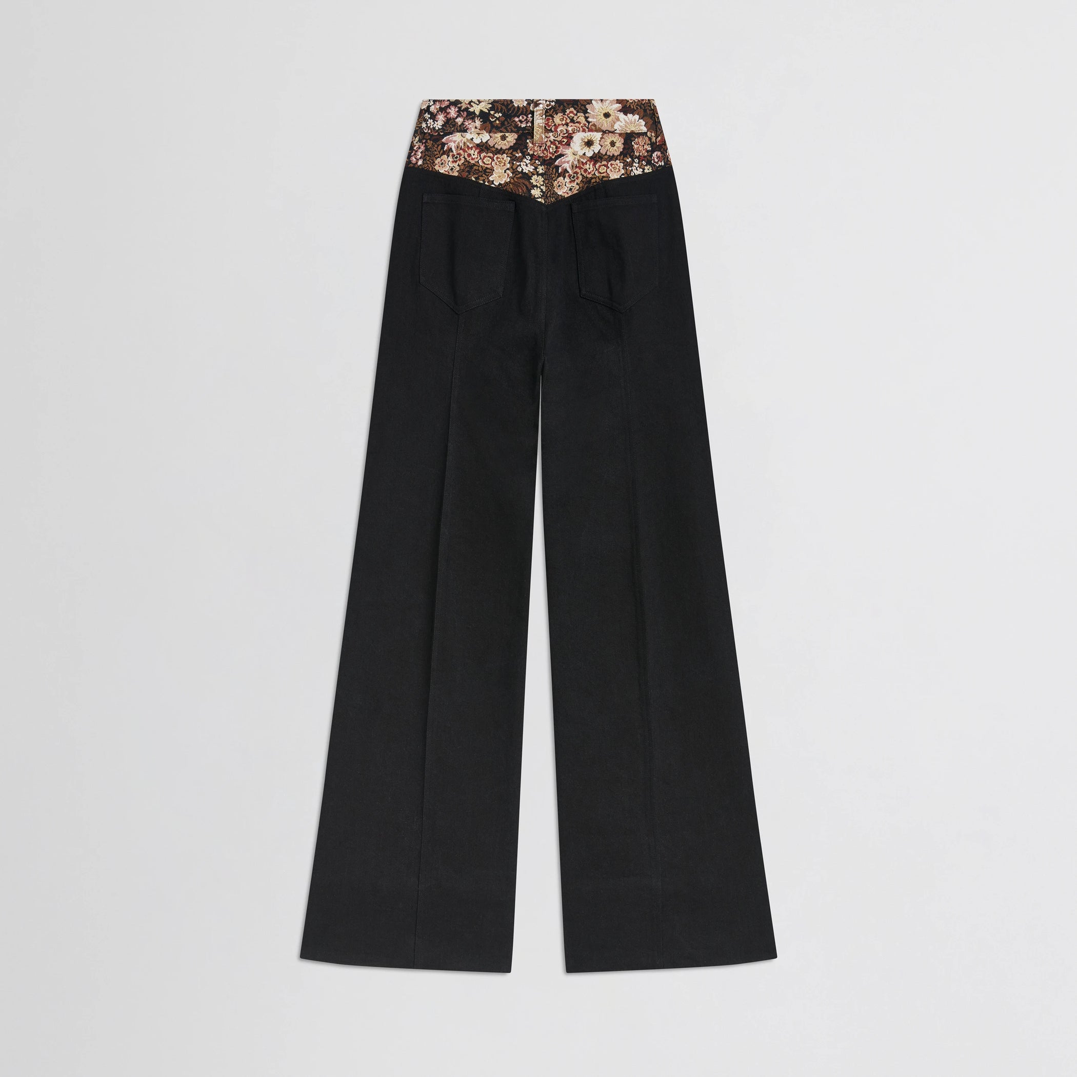 Flat back view of tapestry trousers in black cotton.