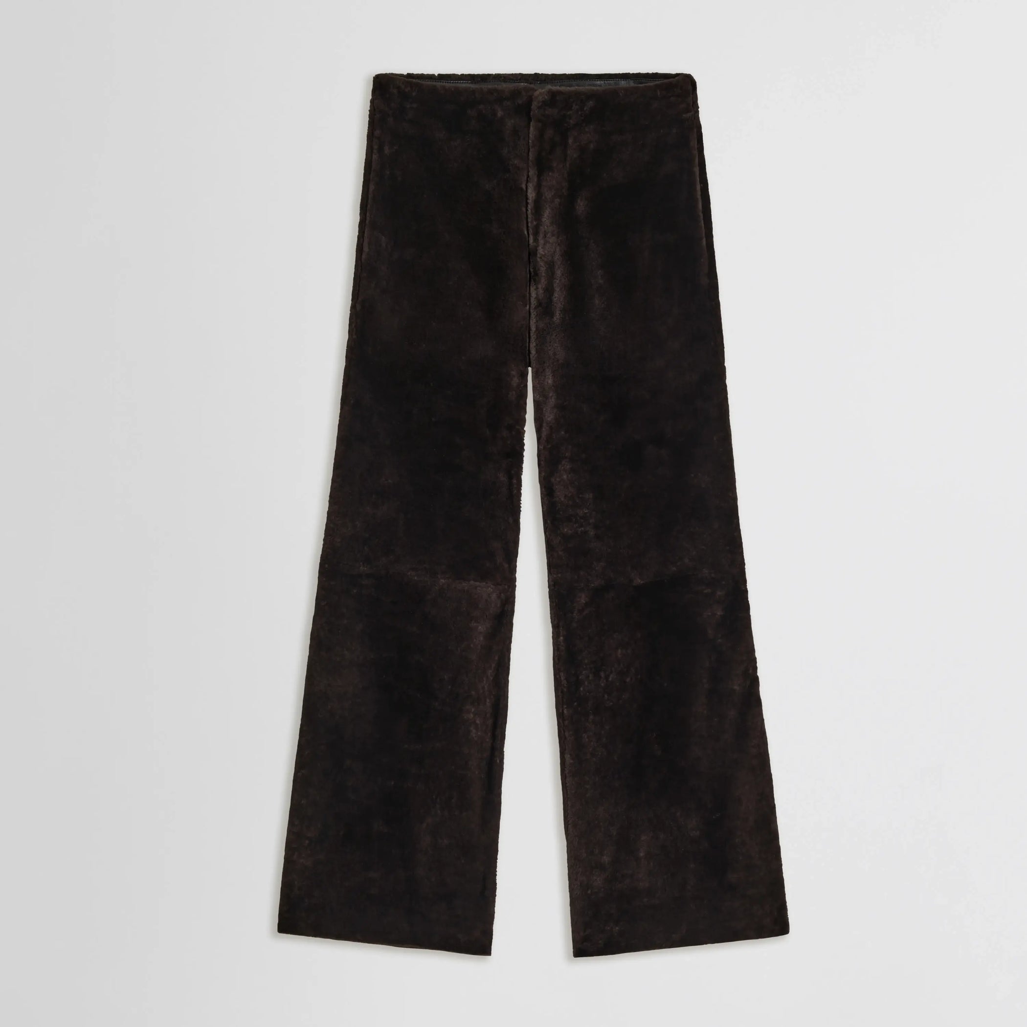 Flat front view of buzzed trousers in caviar shearling 