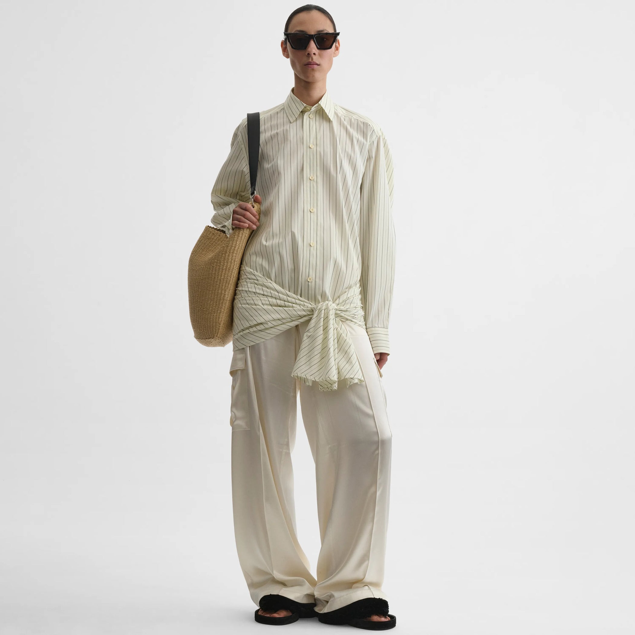 Front view of dropped front shirt in pale lemon cotton