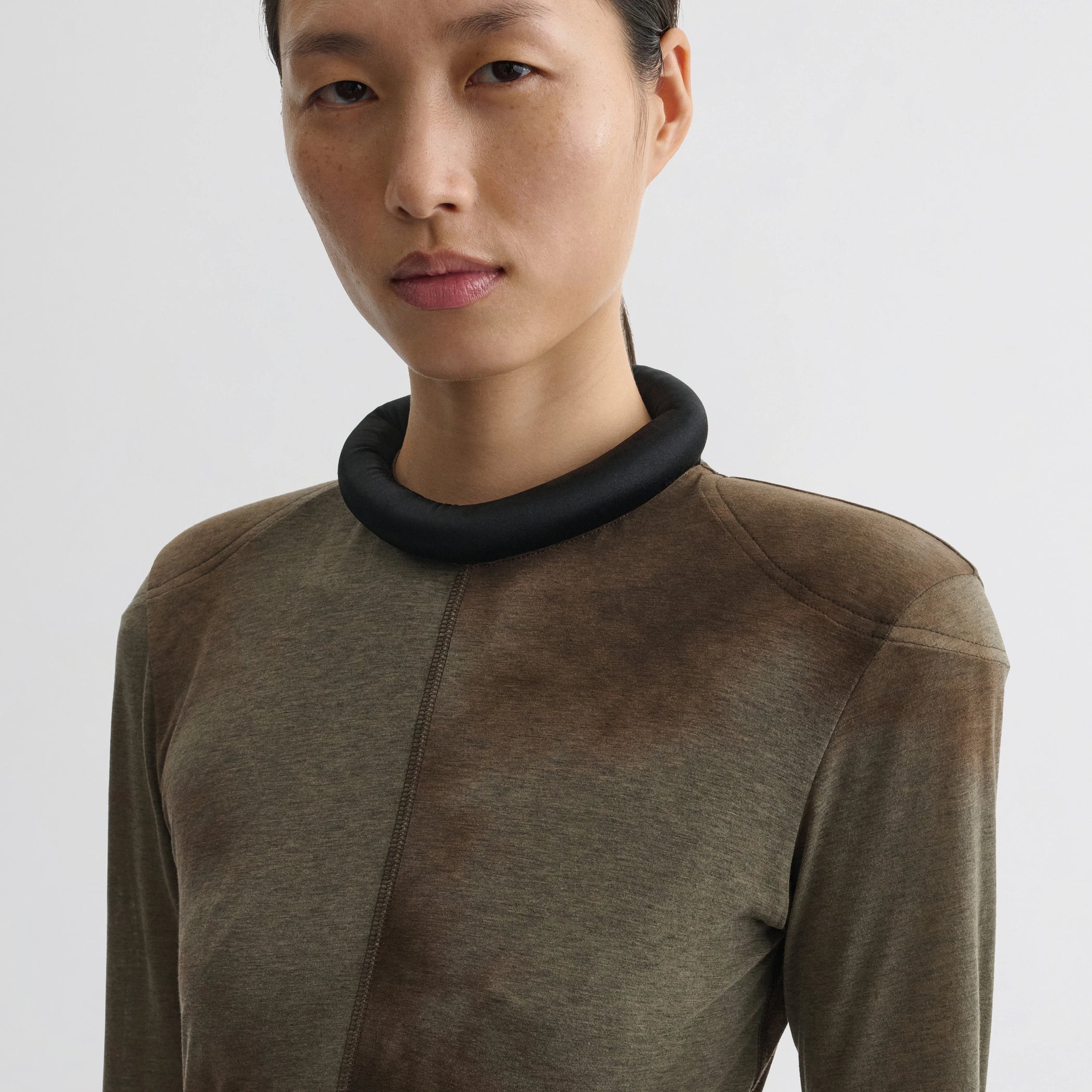Close up detail view of tubular liner dress in tobacco ivory cotton.