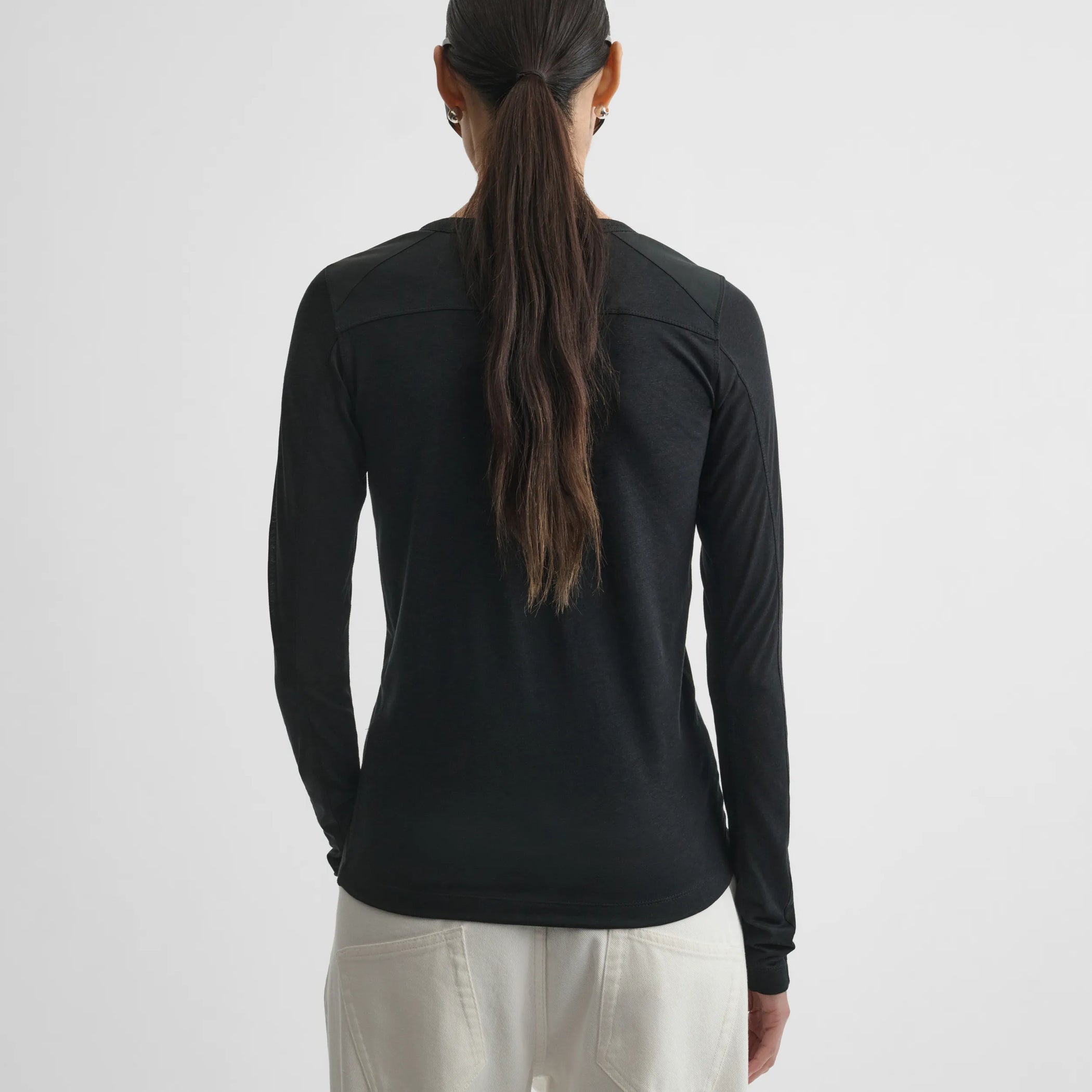 Back view of crewneck top in black cotton