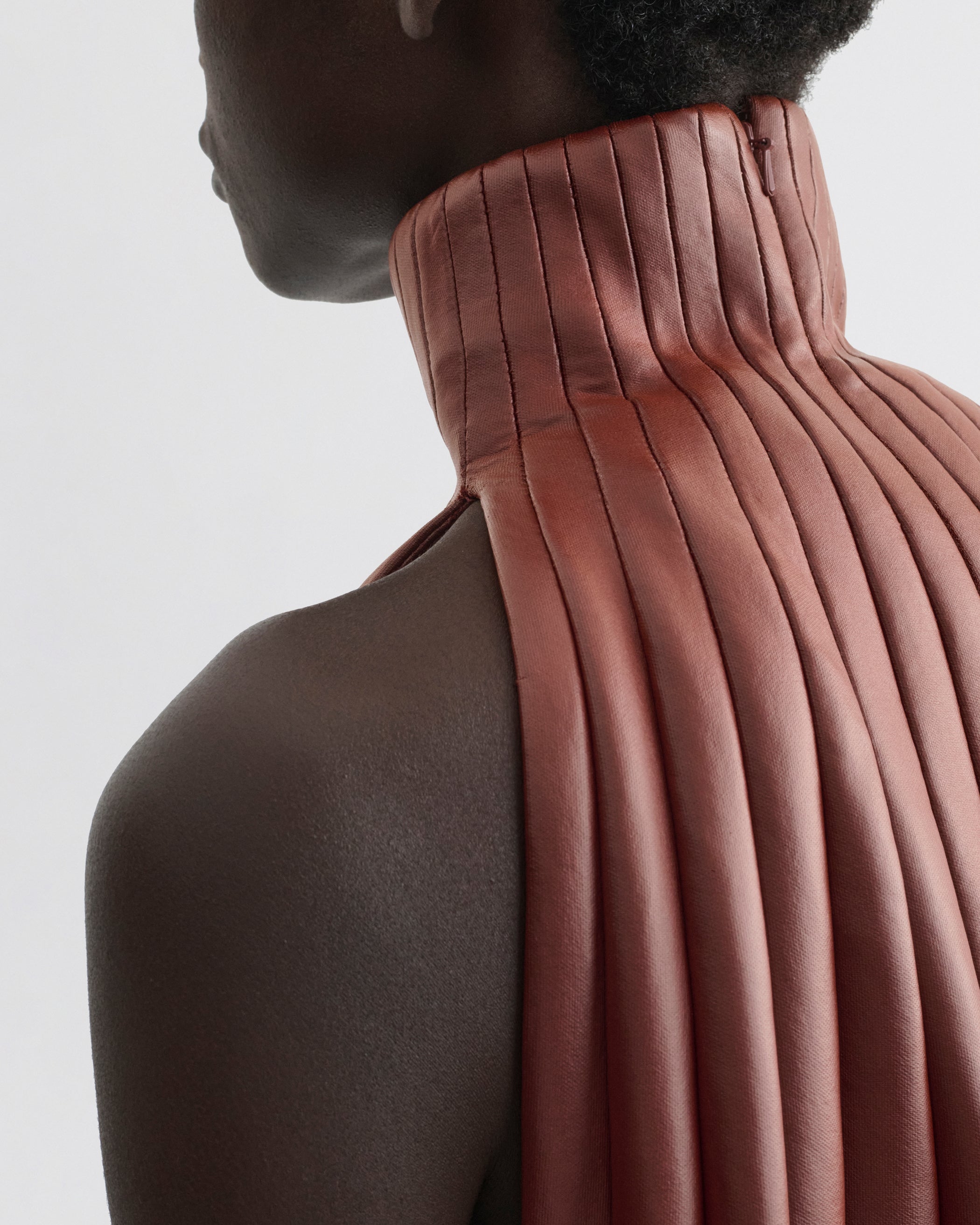 Close up detail view of Accordion Top in brick bonded jersey