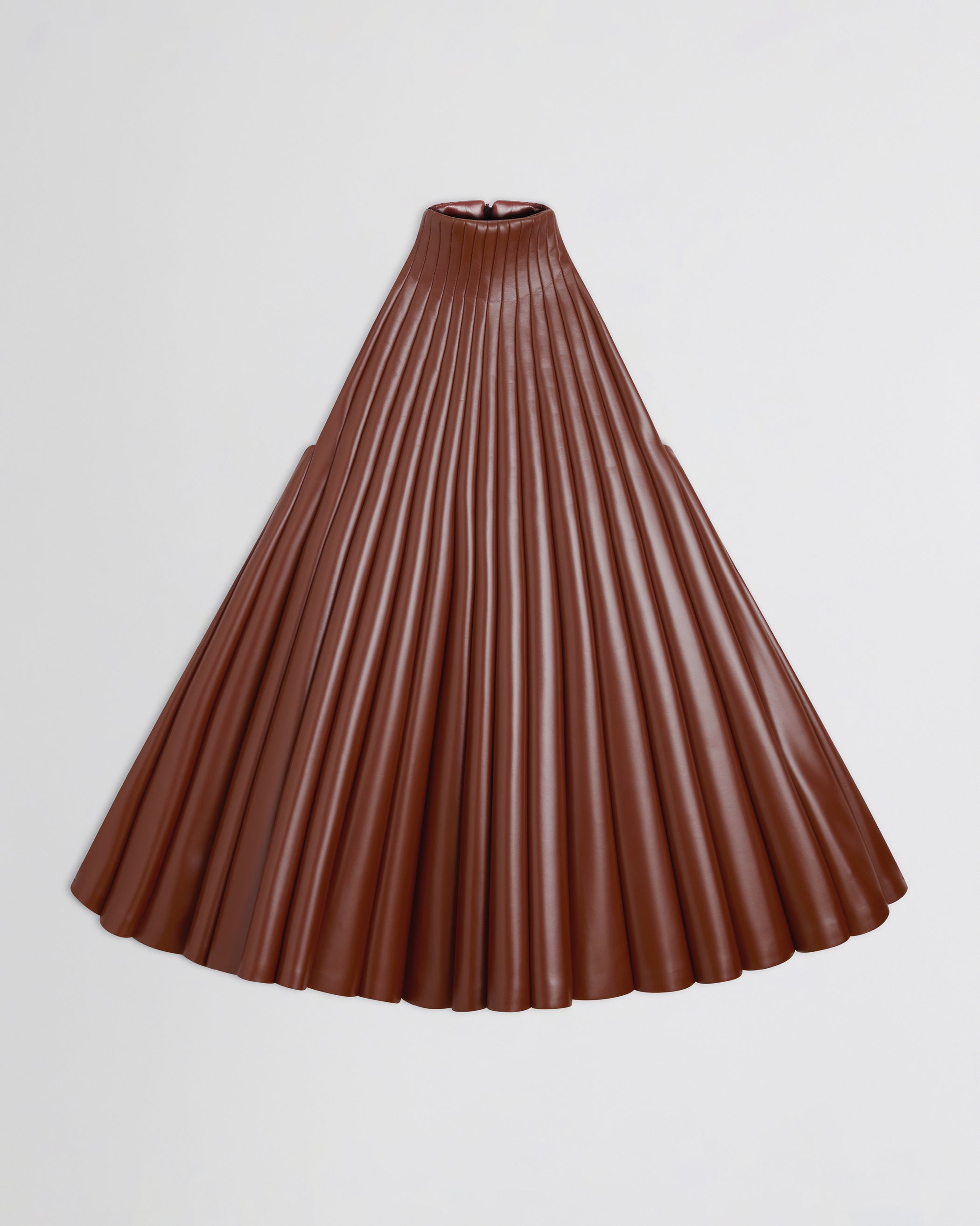 Flat front view of Accordion Top in brick bonded jersey