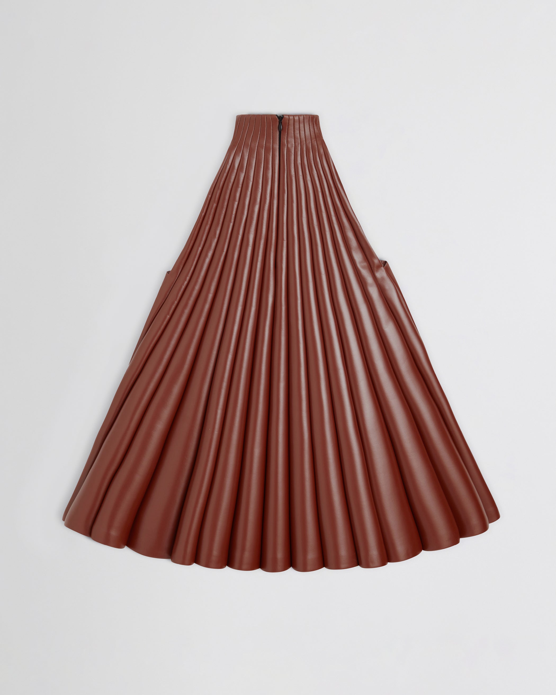 Flat back view of Accordion Top in brick bonded jersey