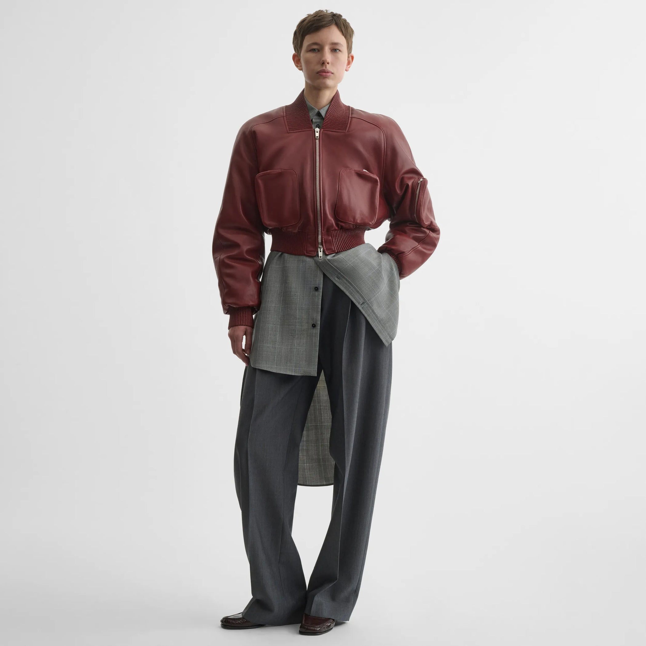 Front view of pocket bomber jacket in brick leather