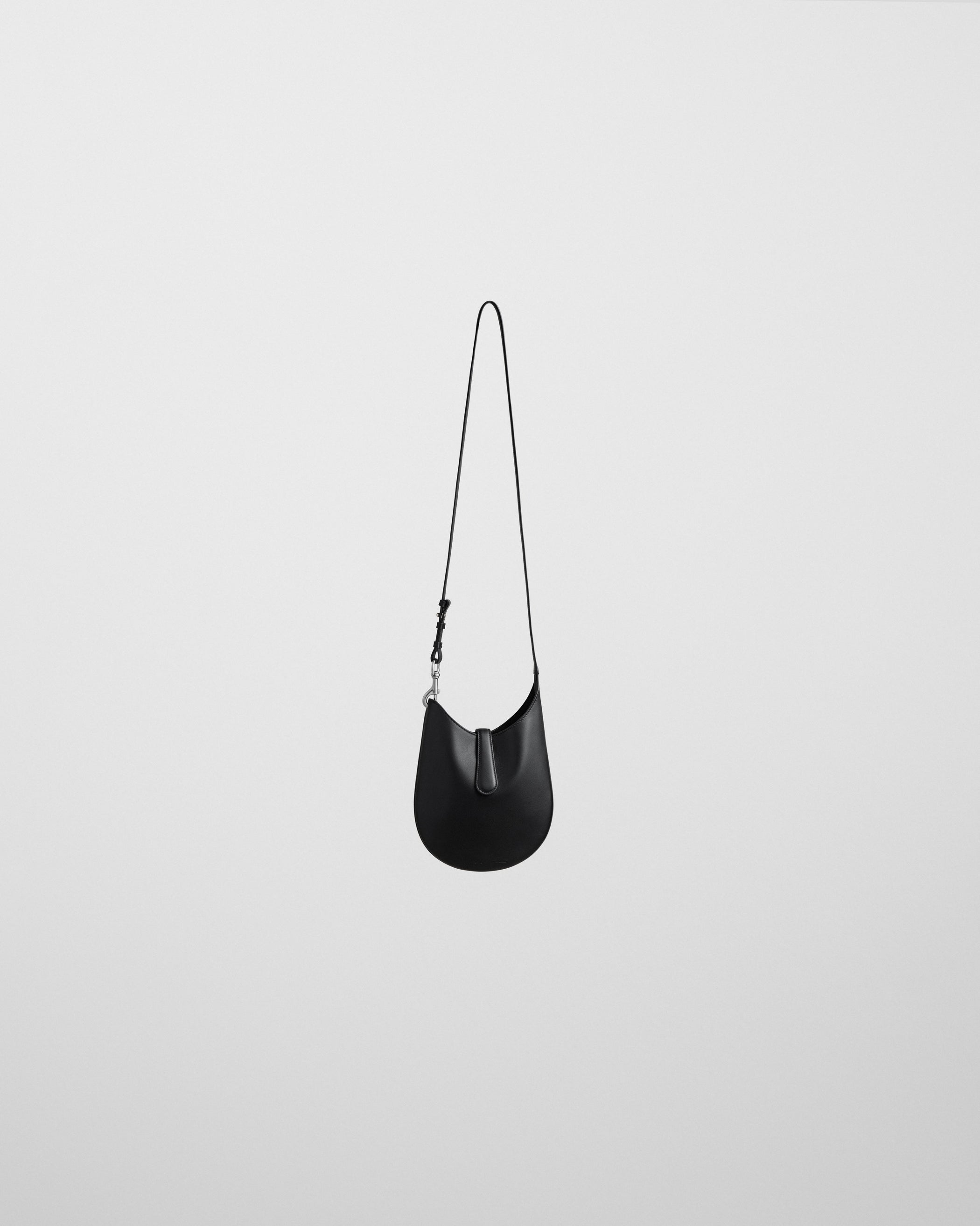 Front view of MINI BEAN SLING in black leather