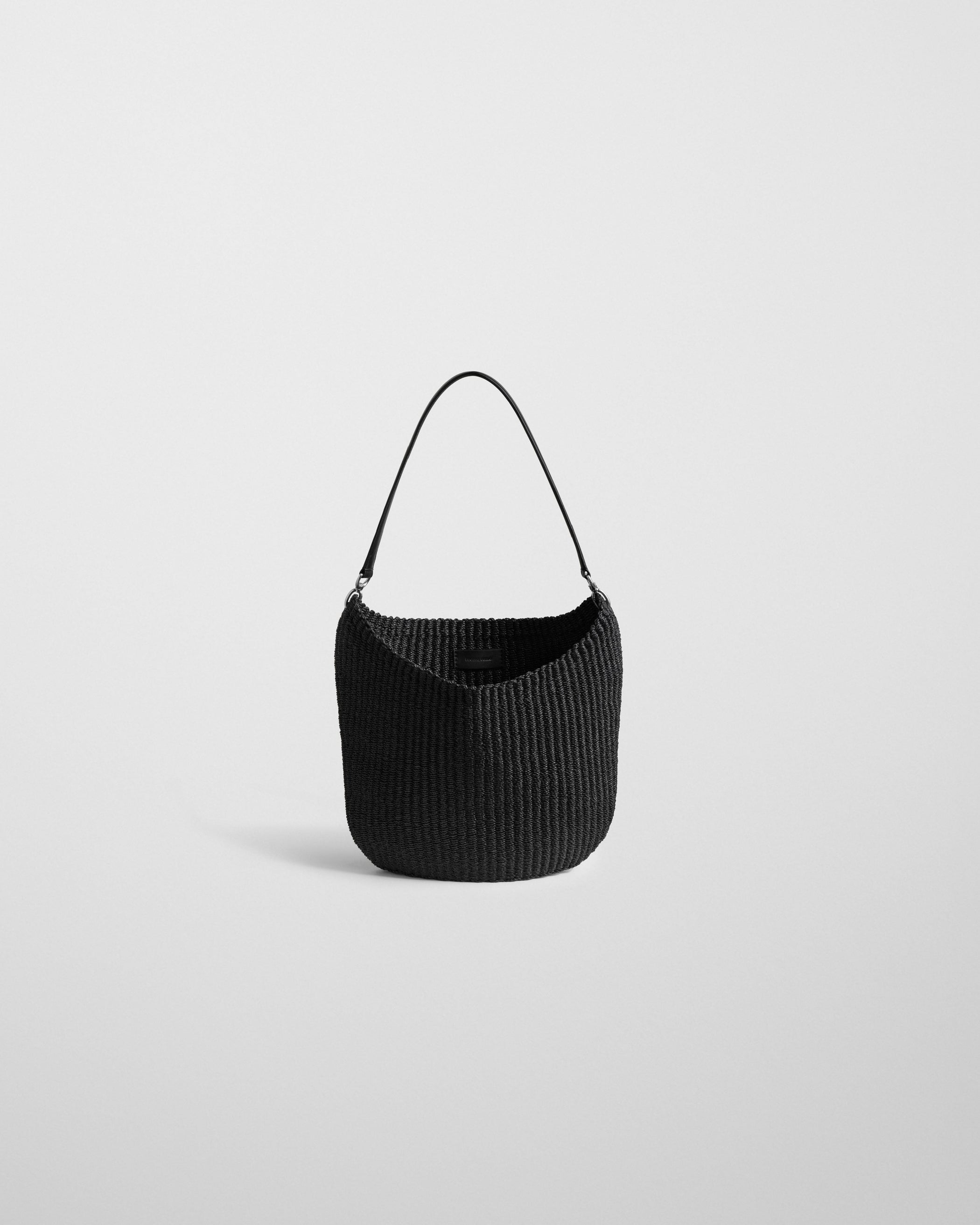 Front view of SMALL SLOPE SLING in black woven viscose