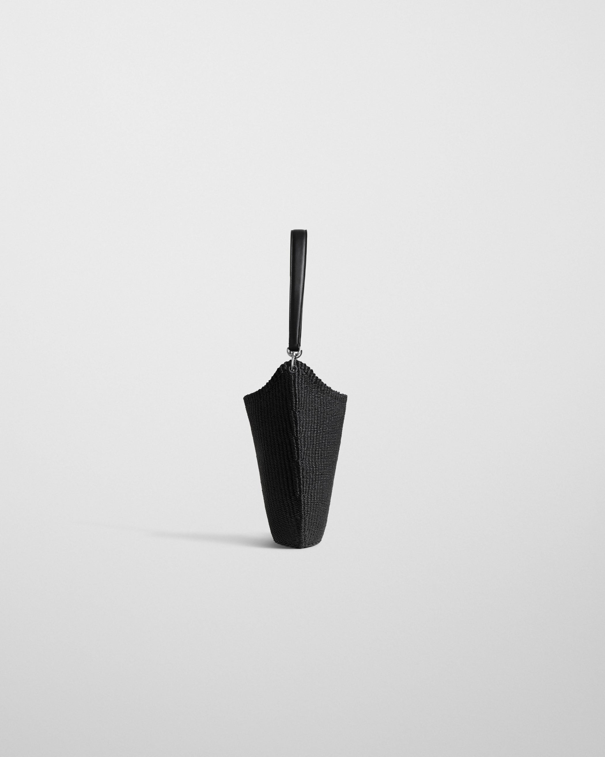 Side view of SMALL SLOPE SLING in black woven viscose