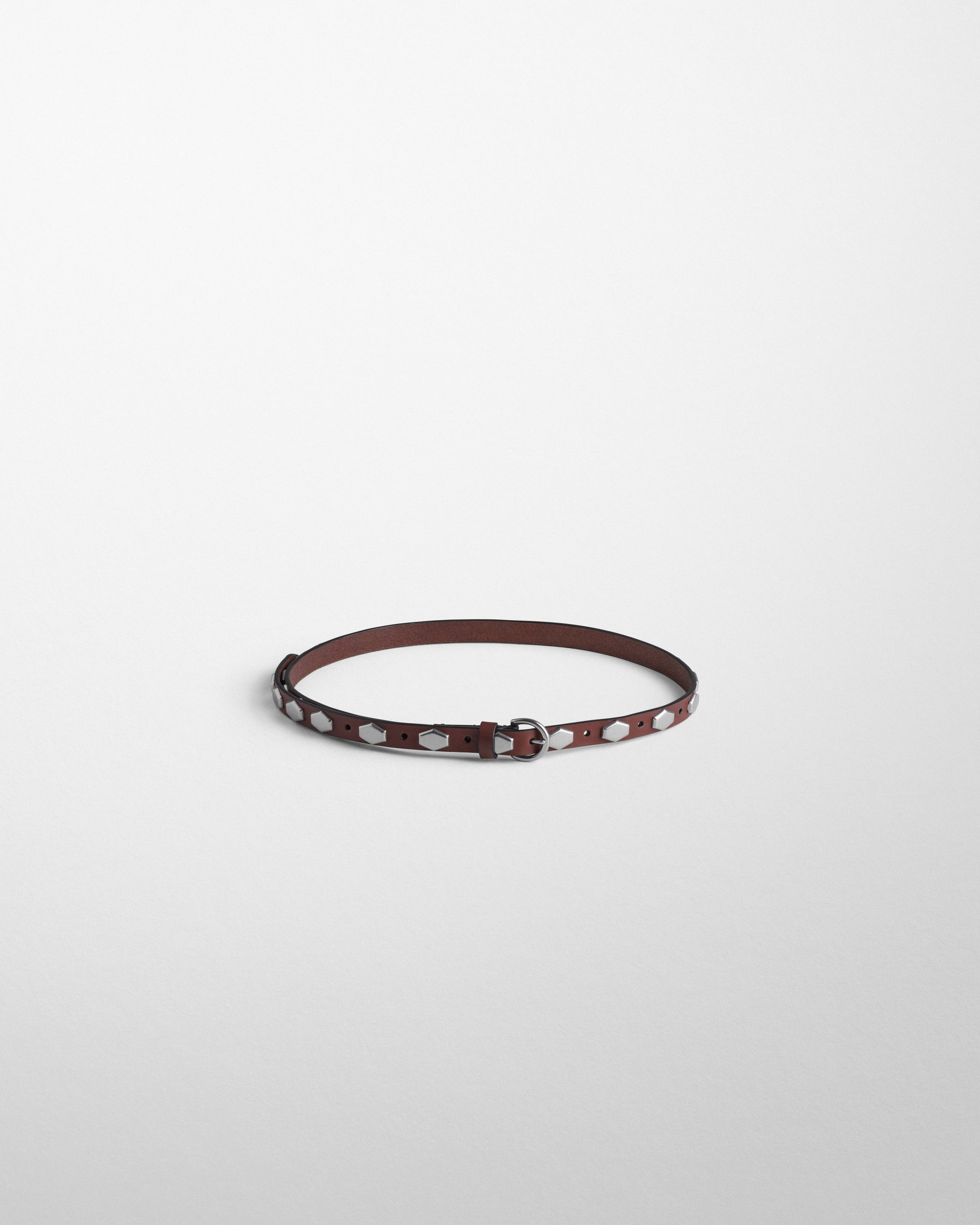 Flat view of NARROW STUD BELT in oxblood leather