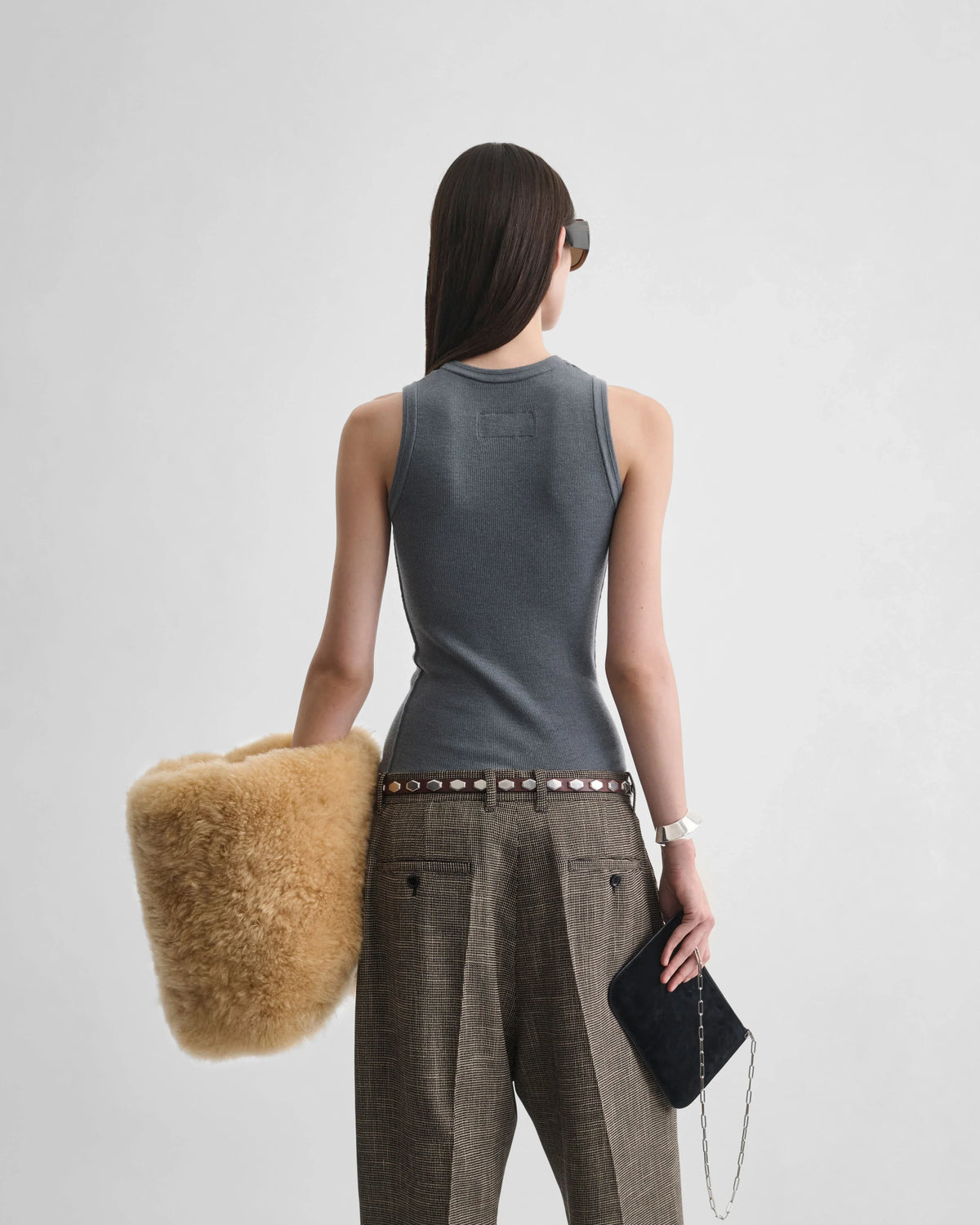 Back view of model wearing RIBBED TANK in grey wool