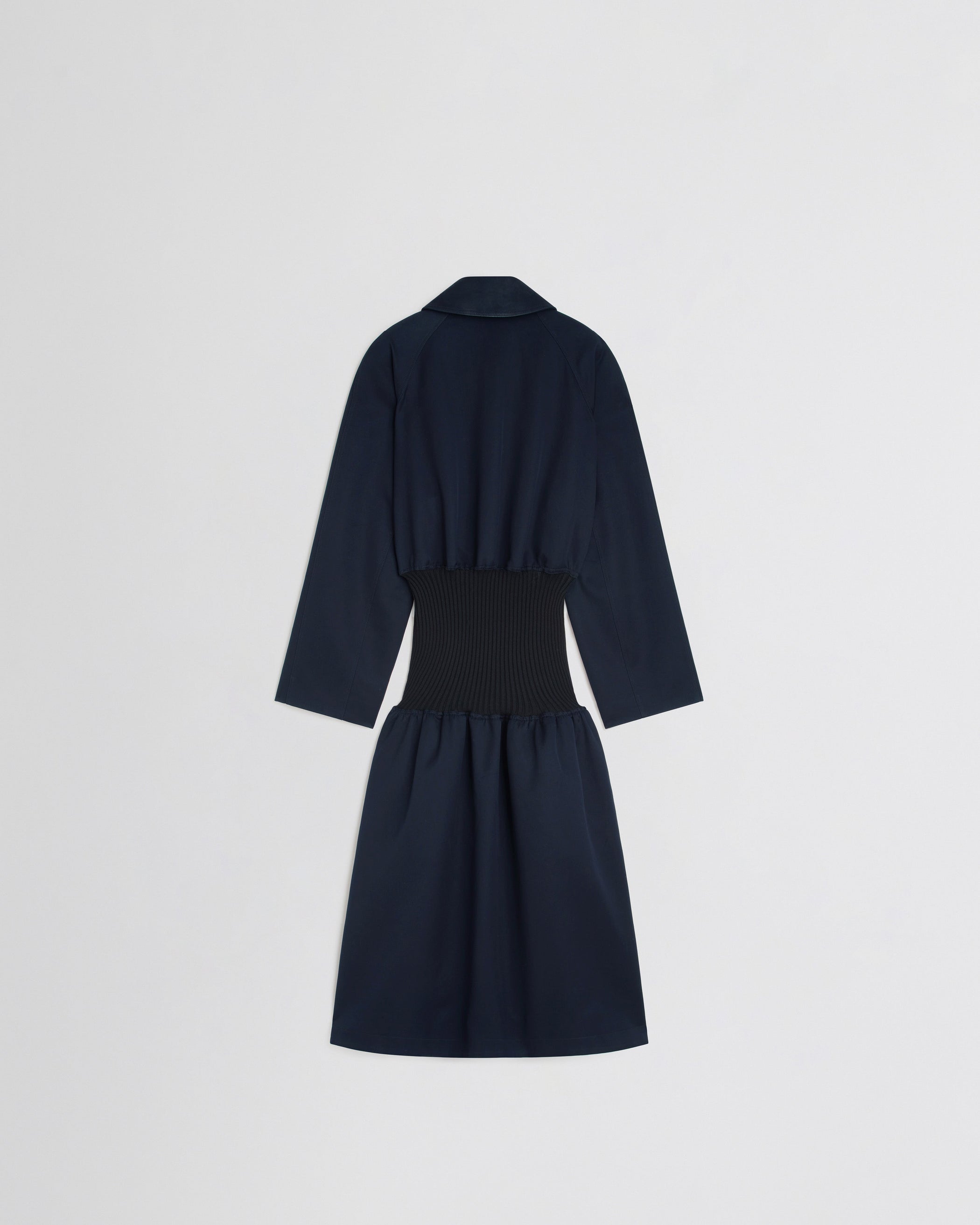 Flat back view of KICK COAT in dark navy cotton