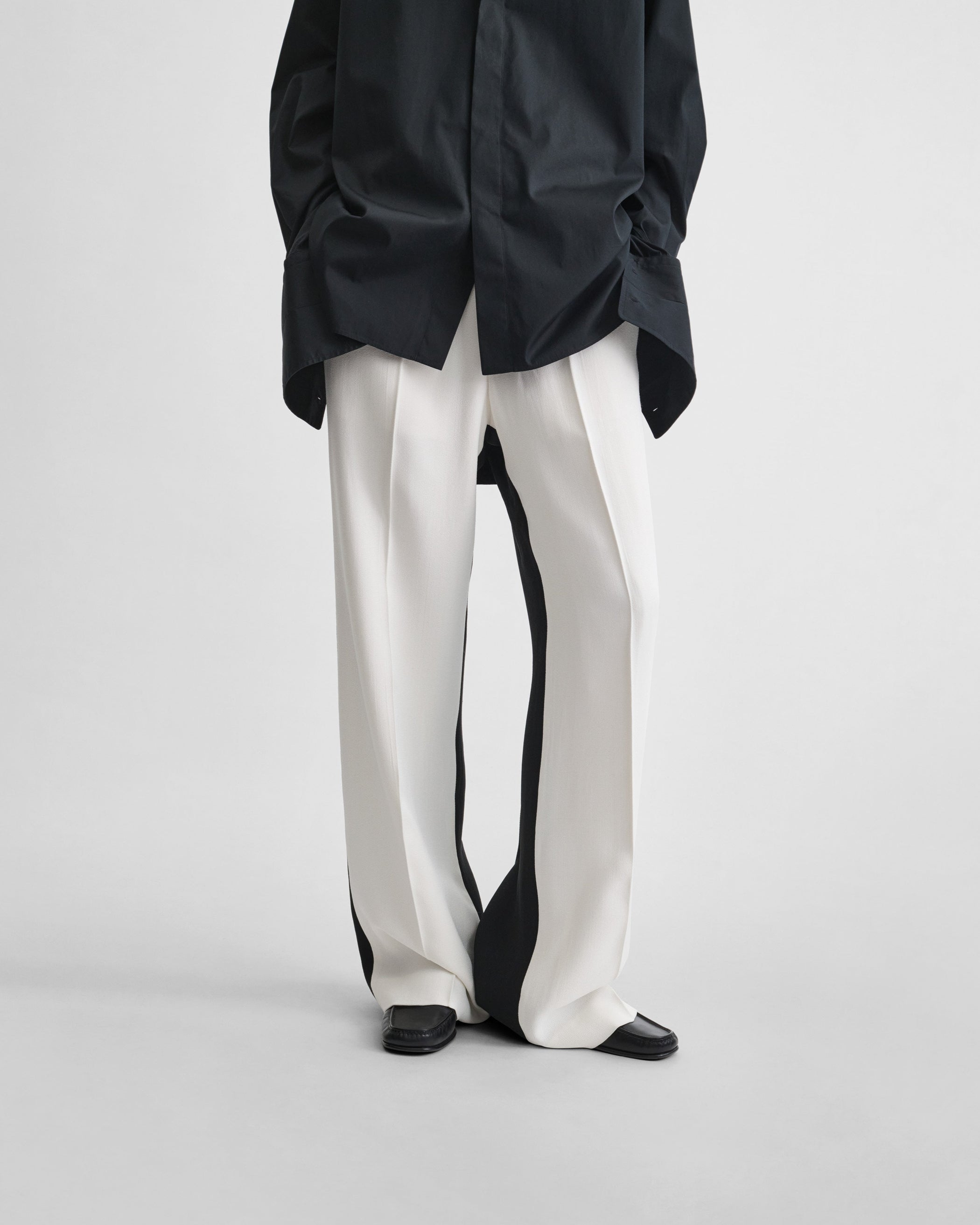 View of STRAIGHT LEG TROUSERS in black/off white woven viscose