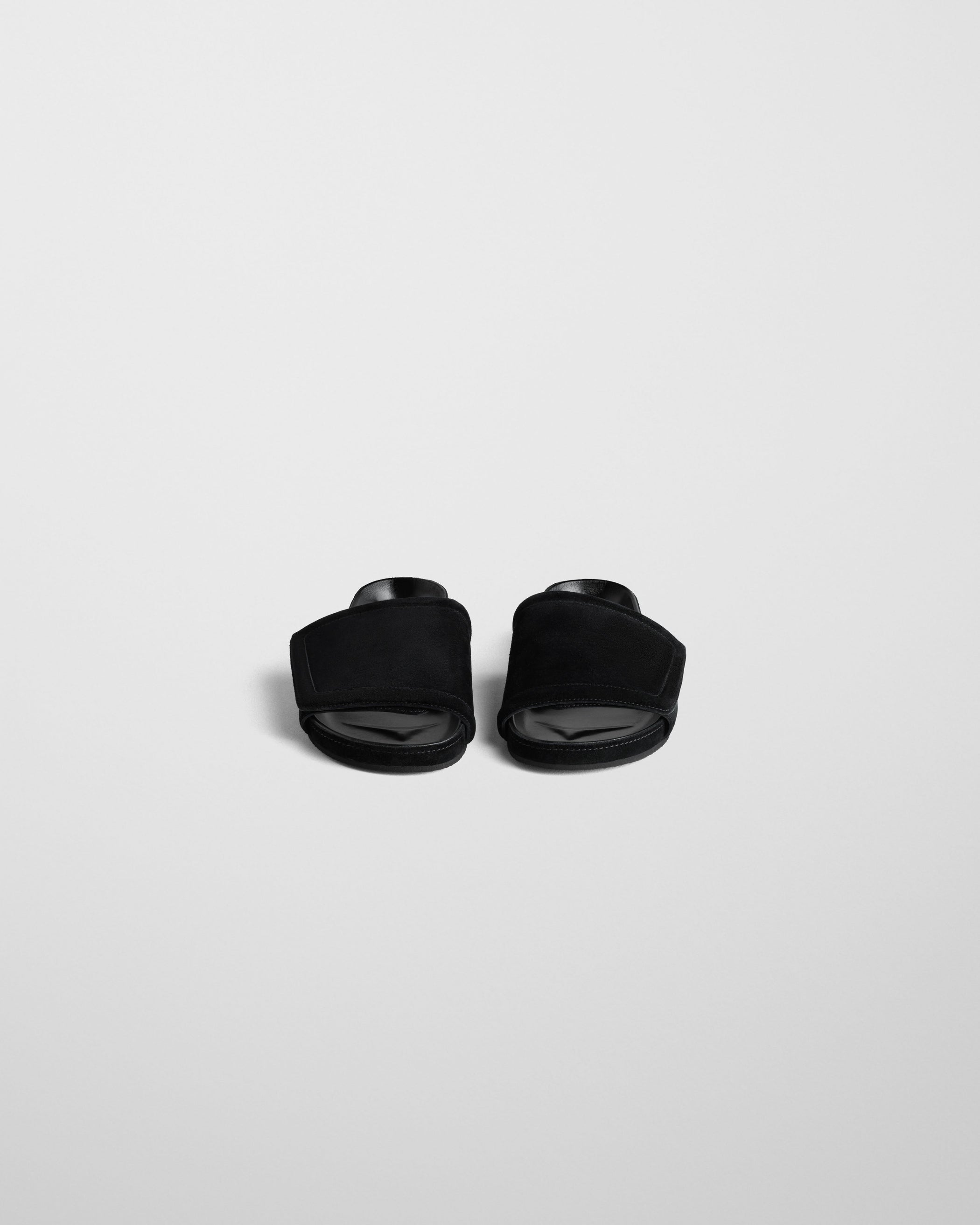 Front view of WIDE SLIDE in black suede