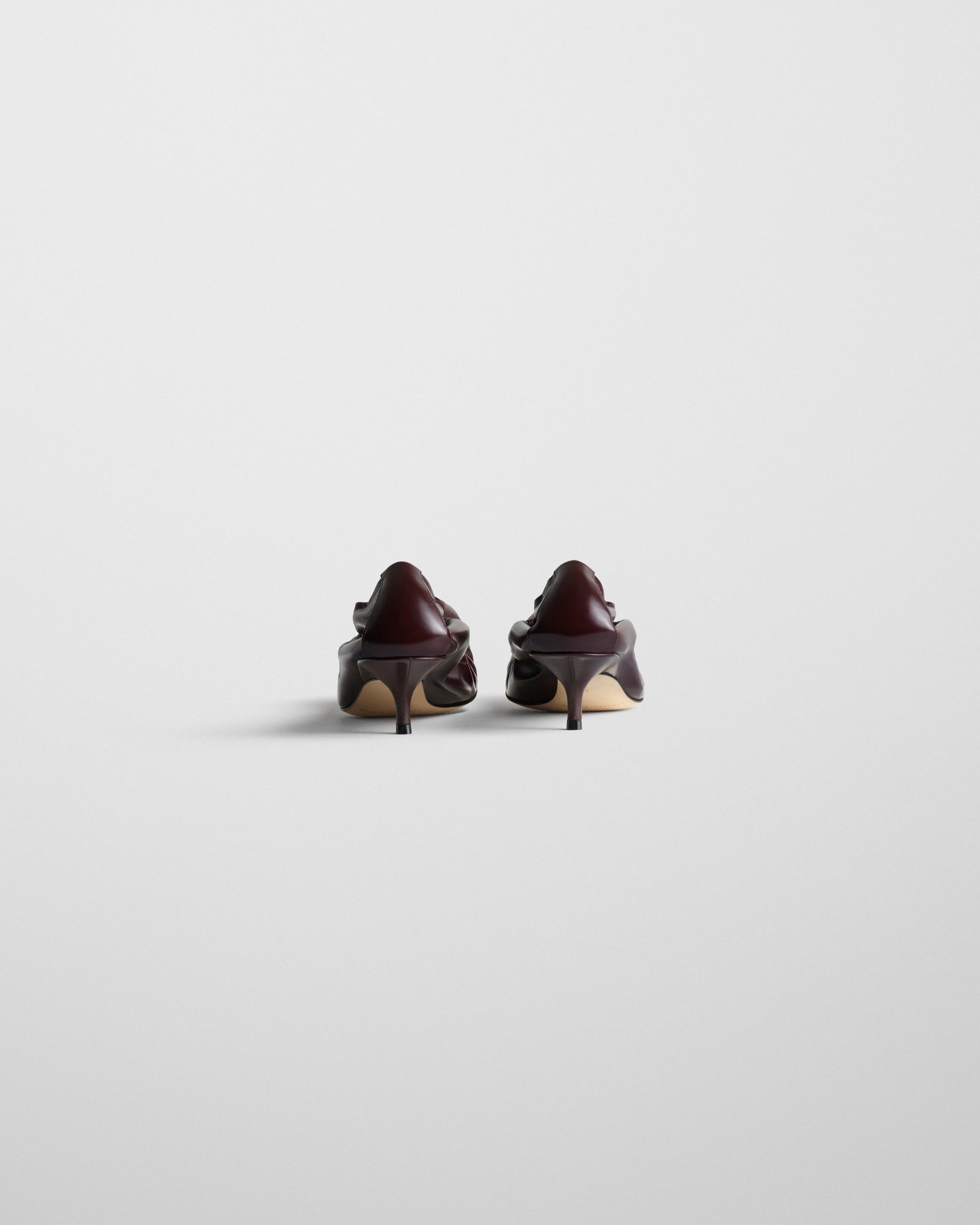 Back view of LOW PUCKER PUMP 45 in oxblood leather
