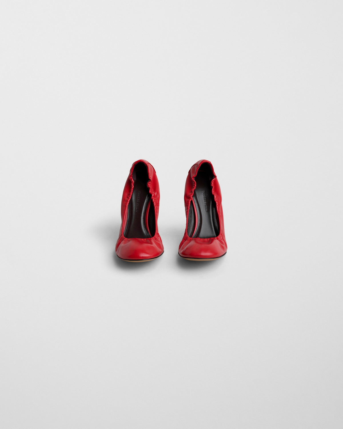 Front view of PUCKER PUMP 100 in bright red leather