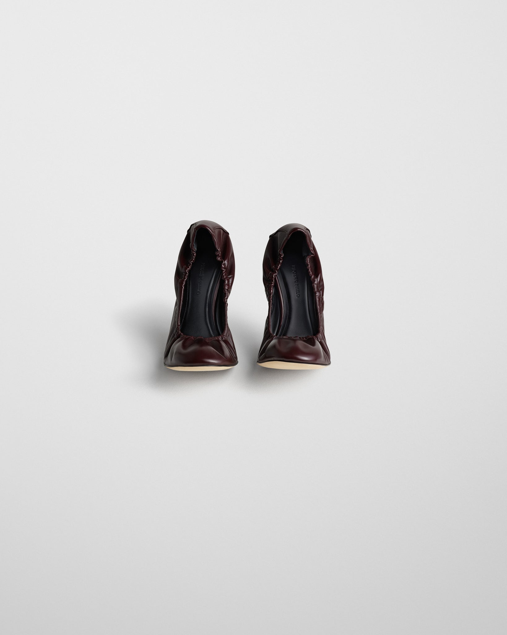 Front view of PUCKER PUMP 100 in oxblood leather
