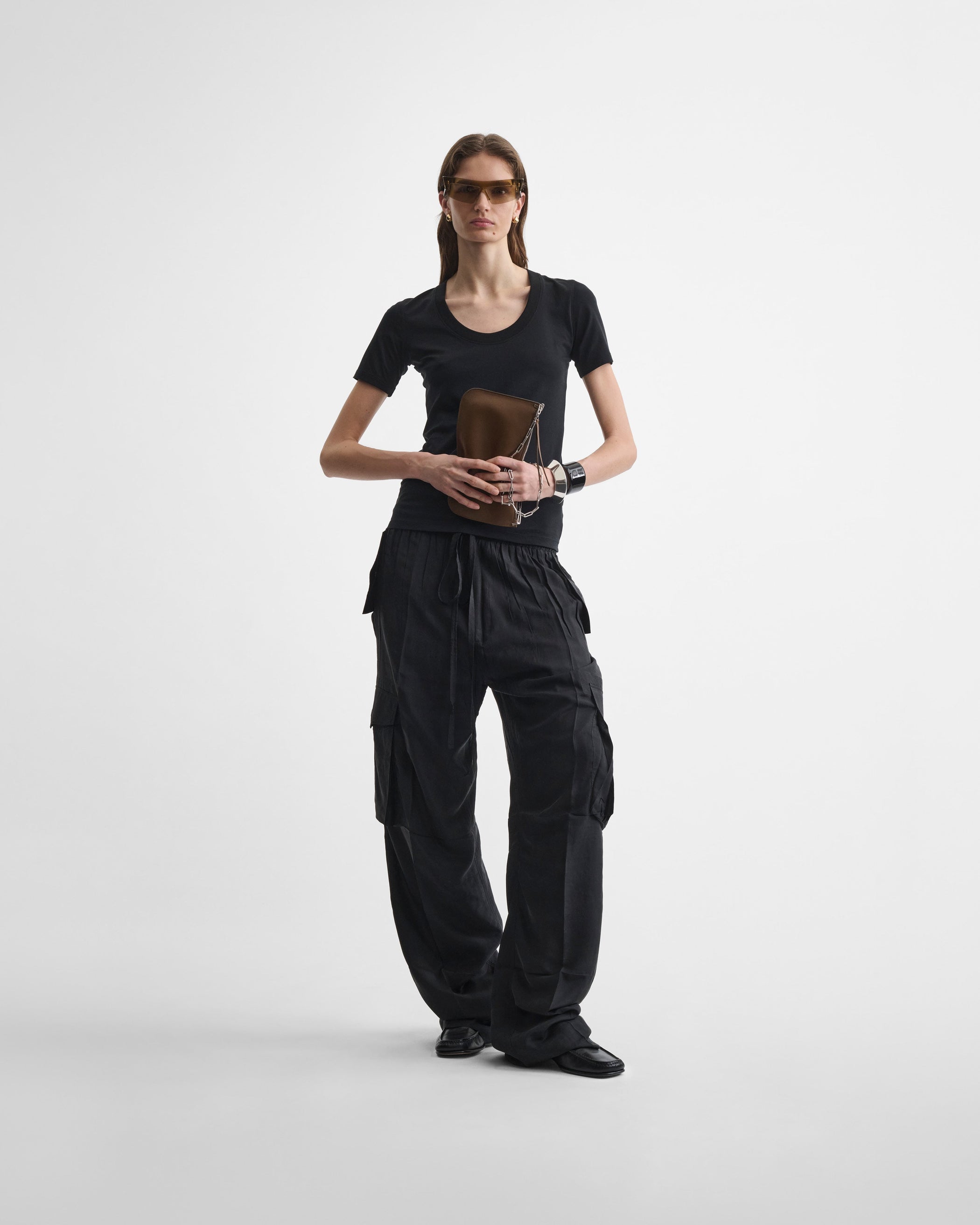 Front view of model wearing SCOOP T. in black cotton