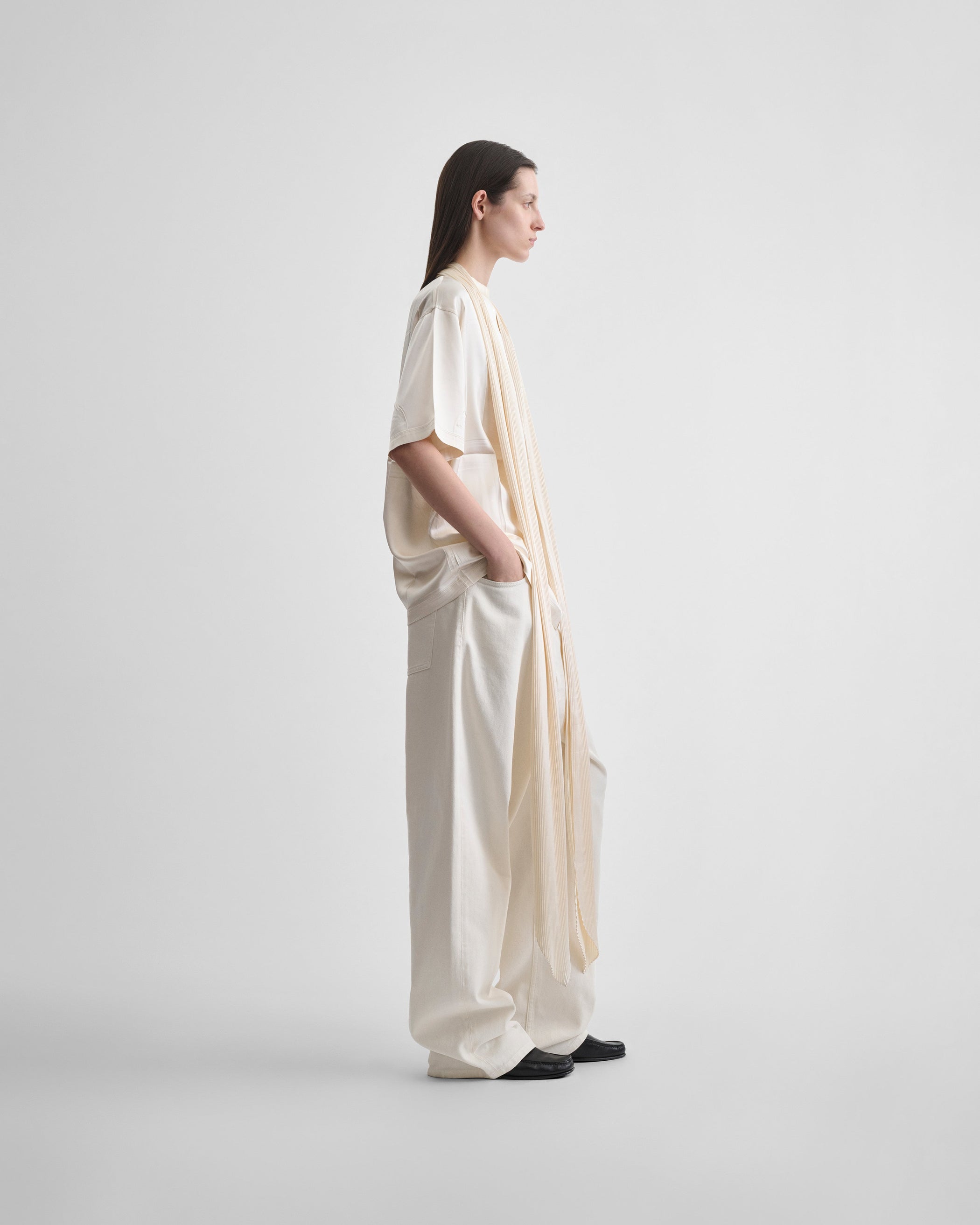 Side view of model wearing SILK SCARF T-SHIRT in cream silk