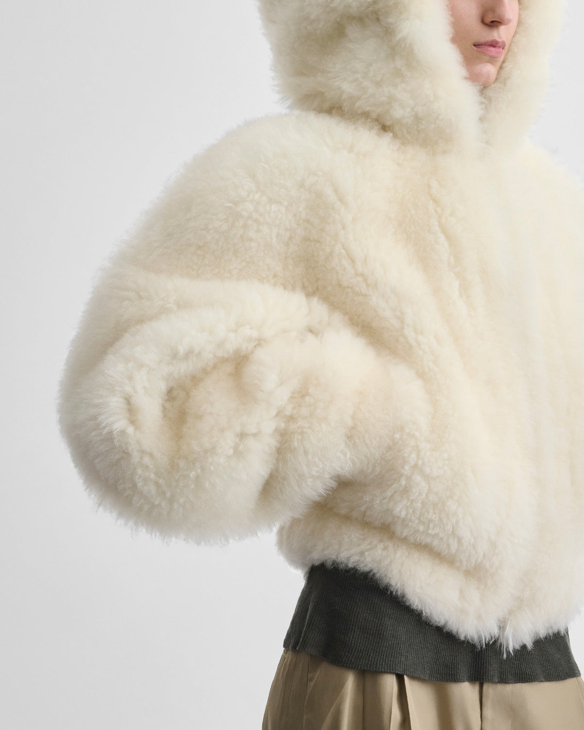 Close up detail view of model wearing SUPER TEDDY HOODIE in ivory shearling