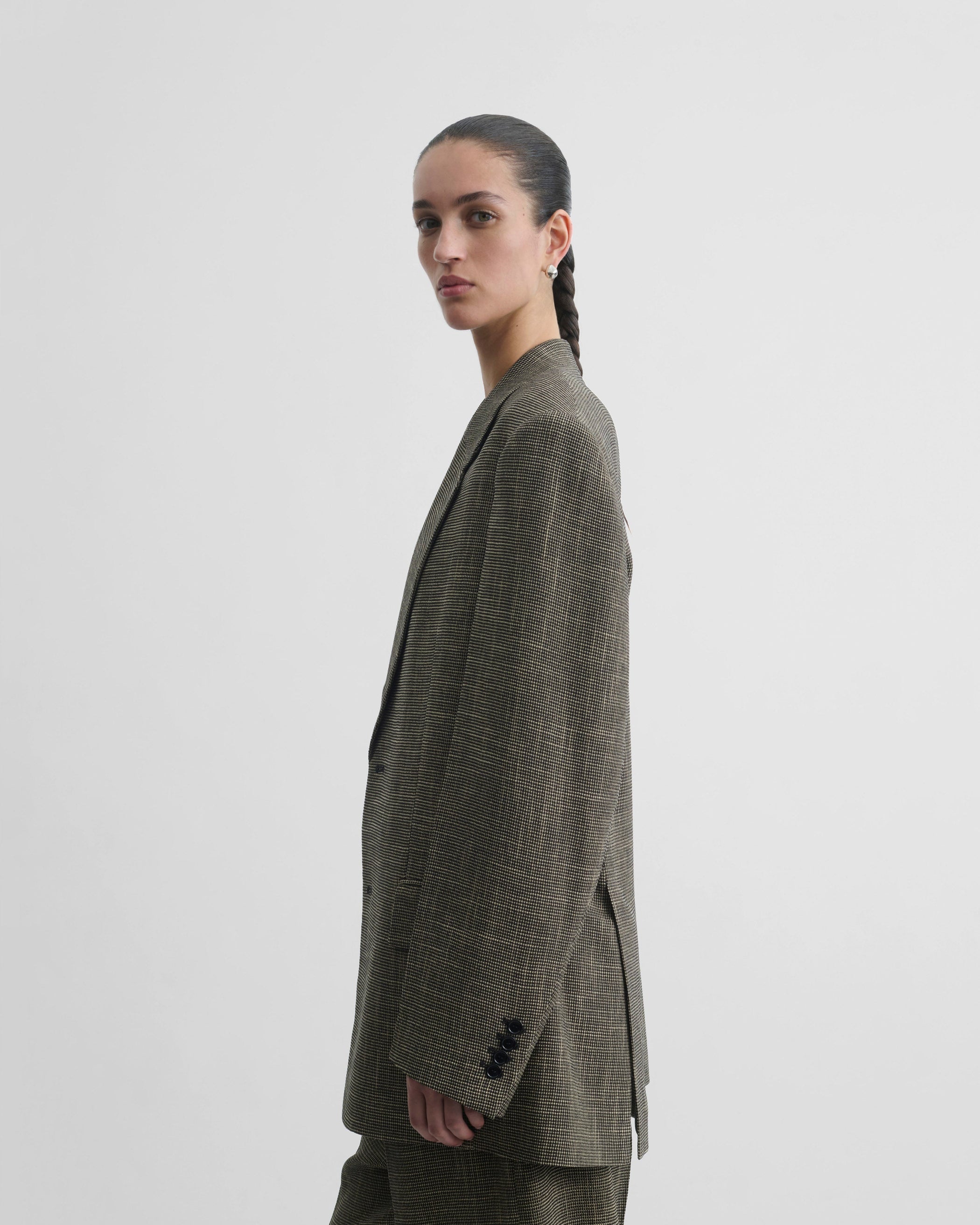 Side close up model view of the Tailored Jacket in salt and pepper