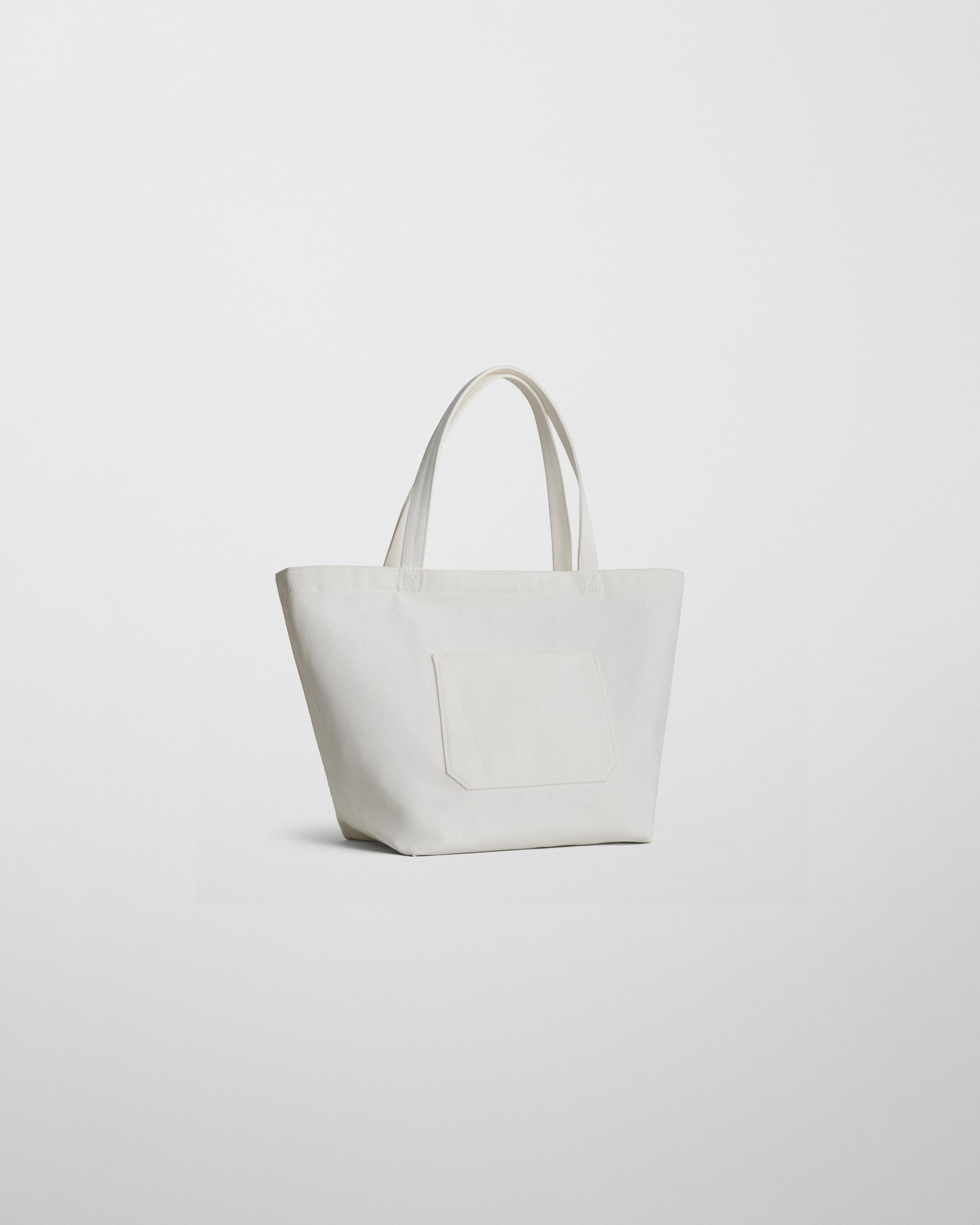 Angled front view of CANVAS CABAS in paper white canvas
