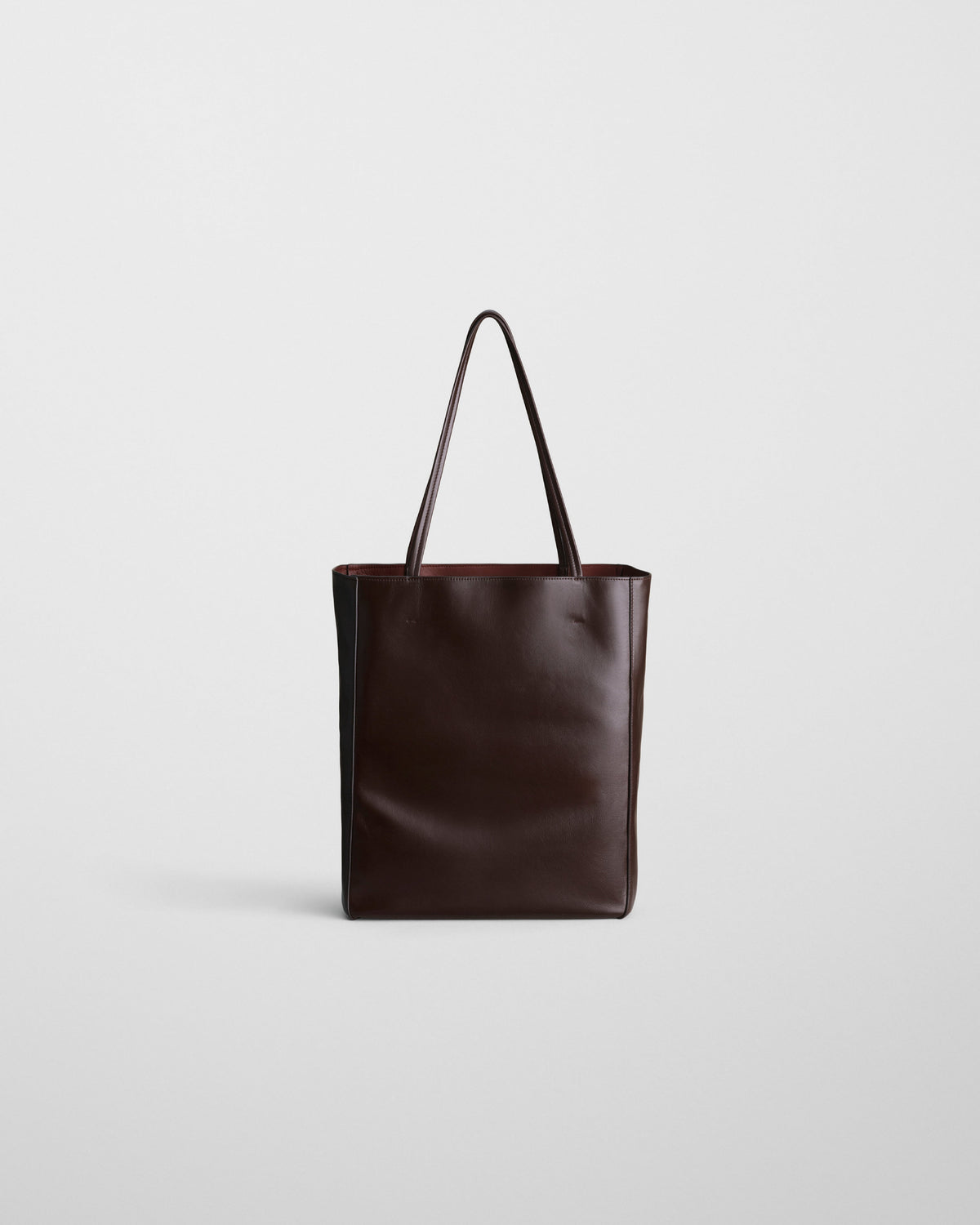 Back view of PAPER TOTE in chocolate brown leather