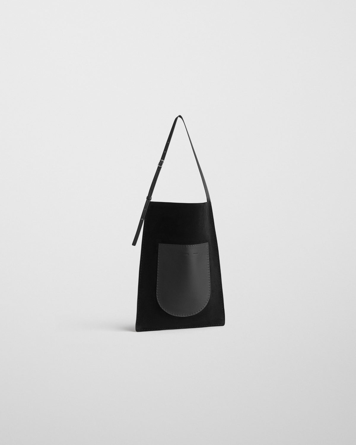 Angled front view of GLOVE MESSENGER BAG in black suede
