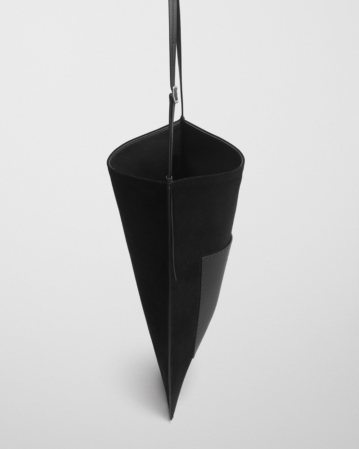 Side view of GLOVE MESSENGER BAG in black suede