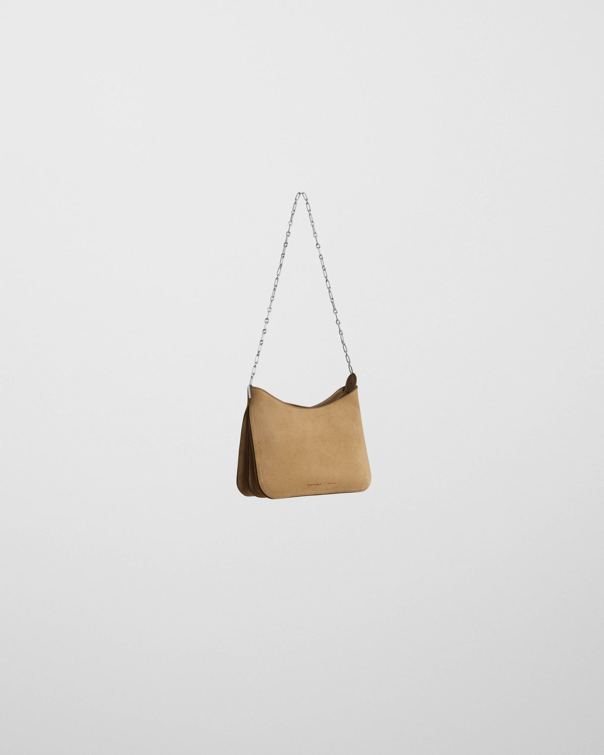 Side view of SMALL GIG BAG in caramel suede