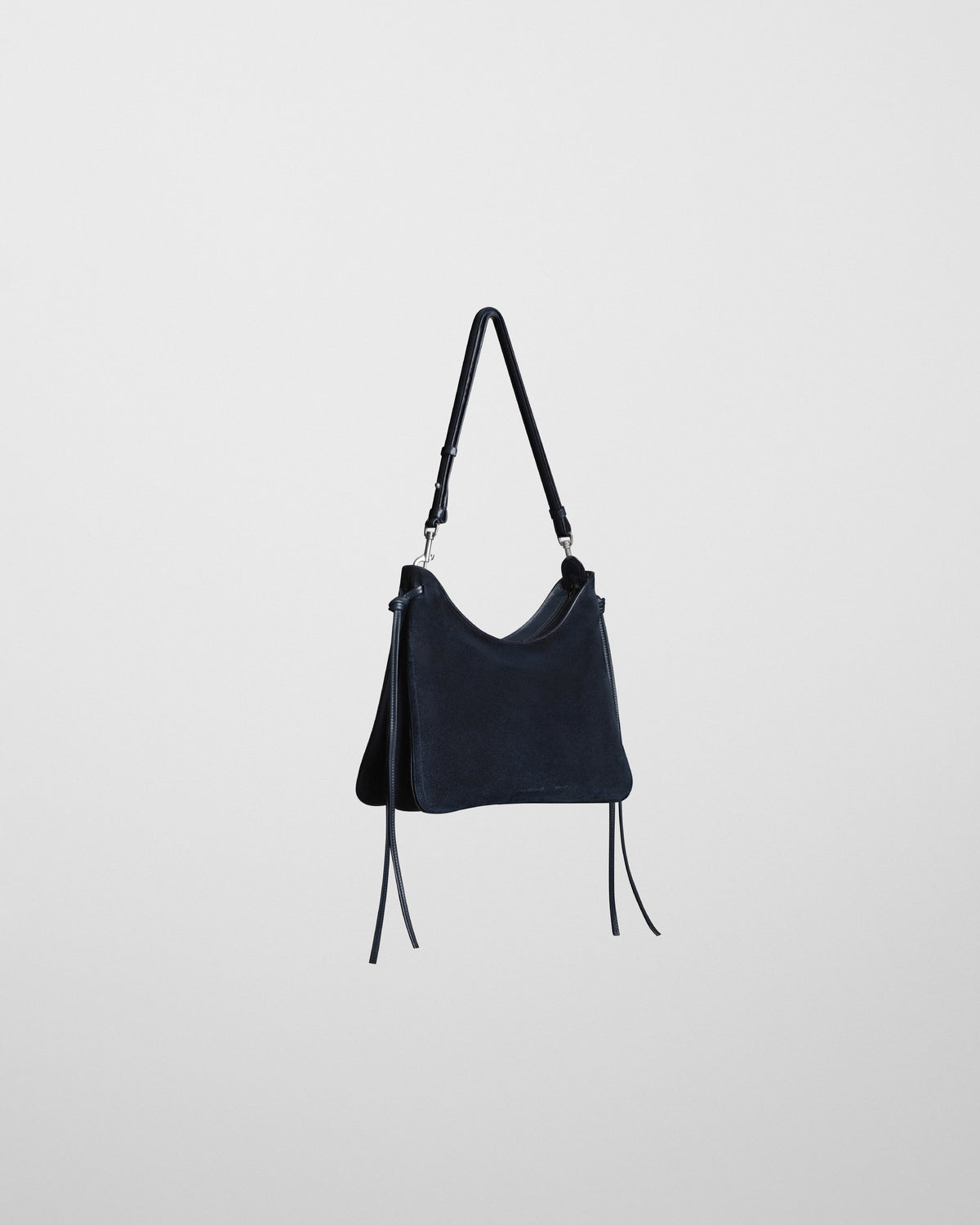 Angled front view of GIG BAG in navy leather