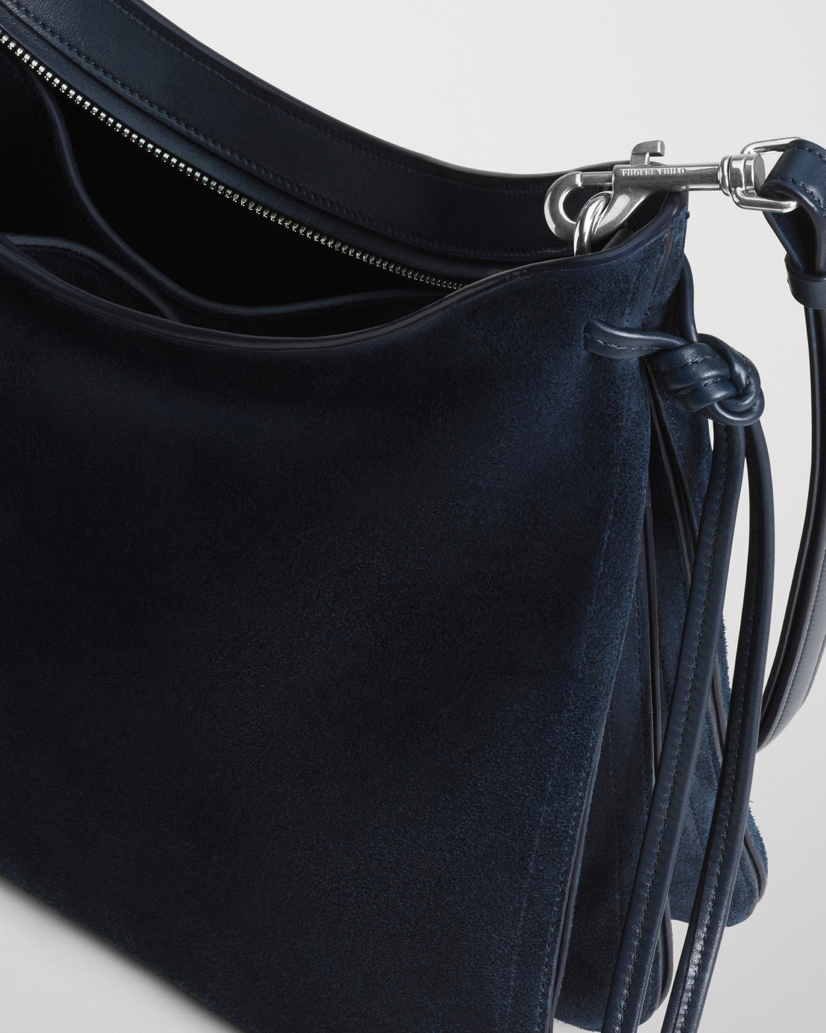 Detail front view of GIG BAG in navy leather