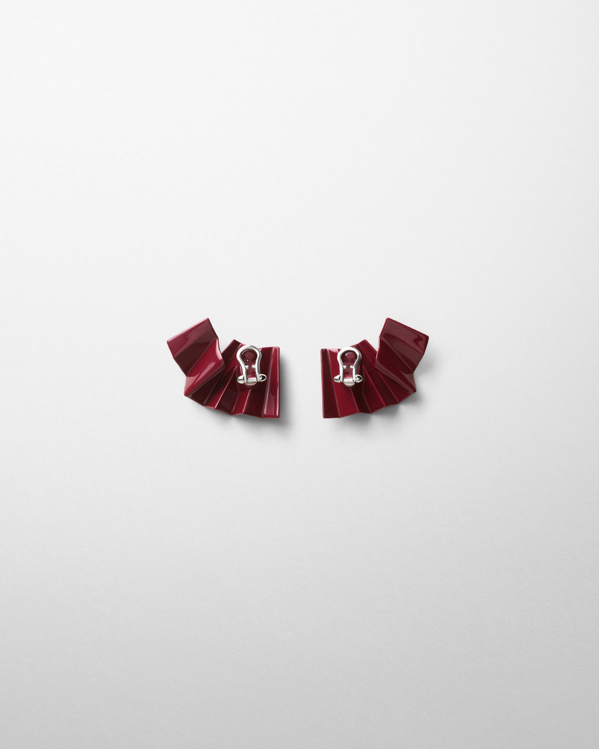 Back view of PLEATED EARRING in oxblood enamel