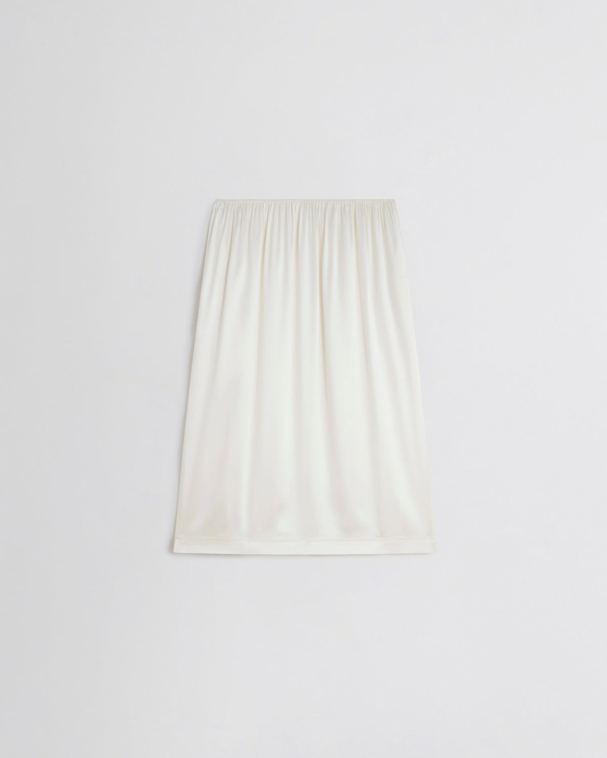 Back view of LIQUID SLIP SKIRT in acid ivory silk