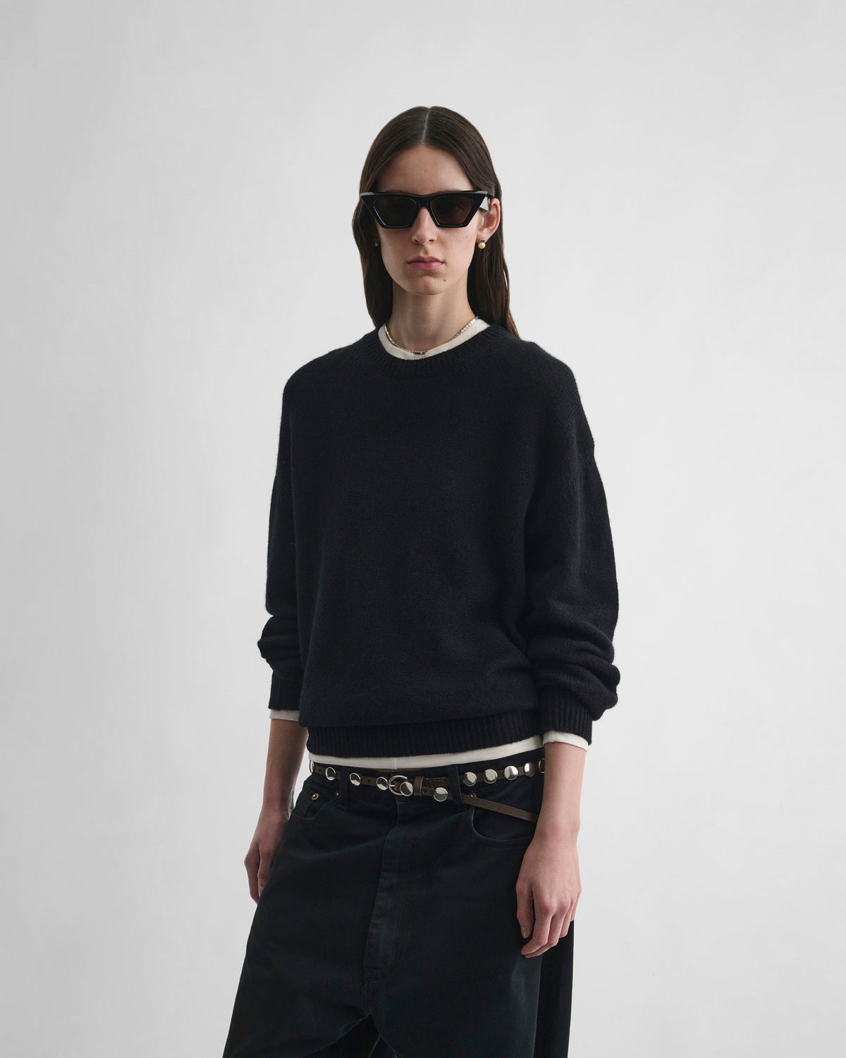 Front view of model wearing CREWNECK SWEATER in black cashmere