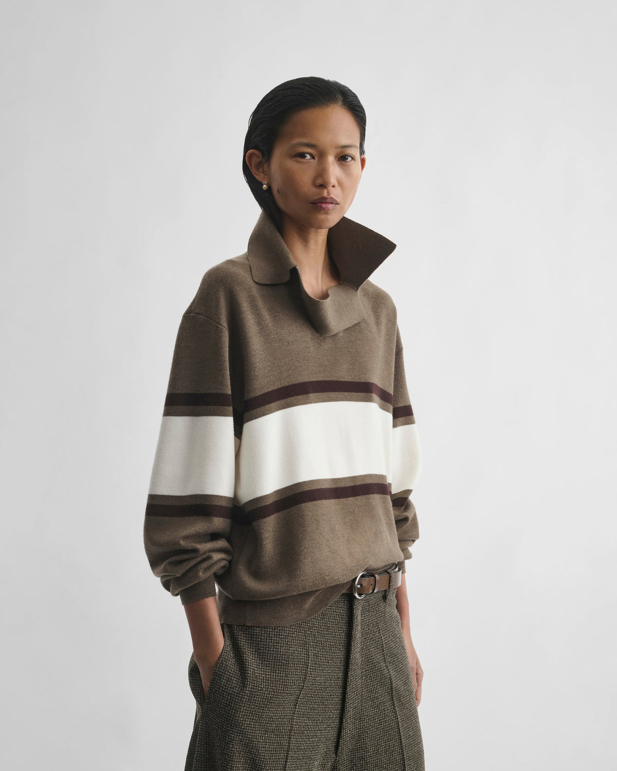 Front view of model wearing OPEN POLO SWEATER in cigar/cream/chocolate brown wool