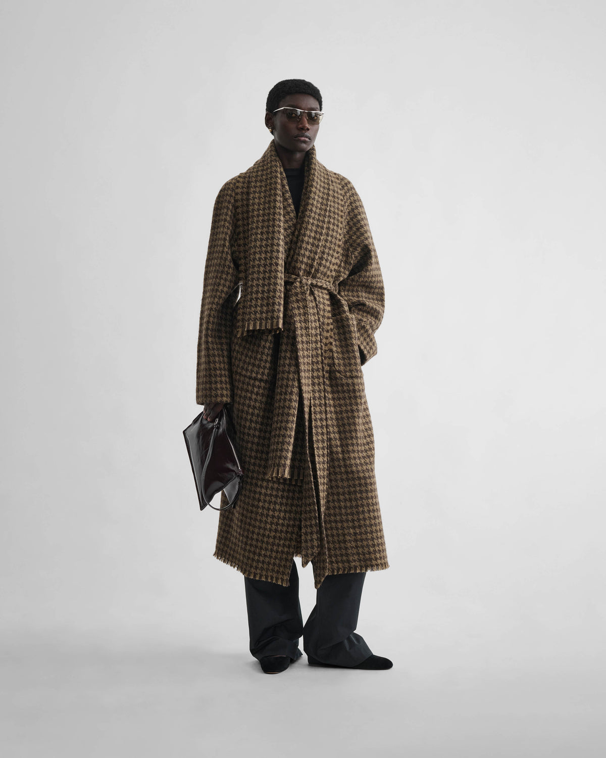 Front view of model wearing BLANKET COAT in brown bronze wool