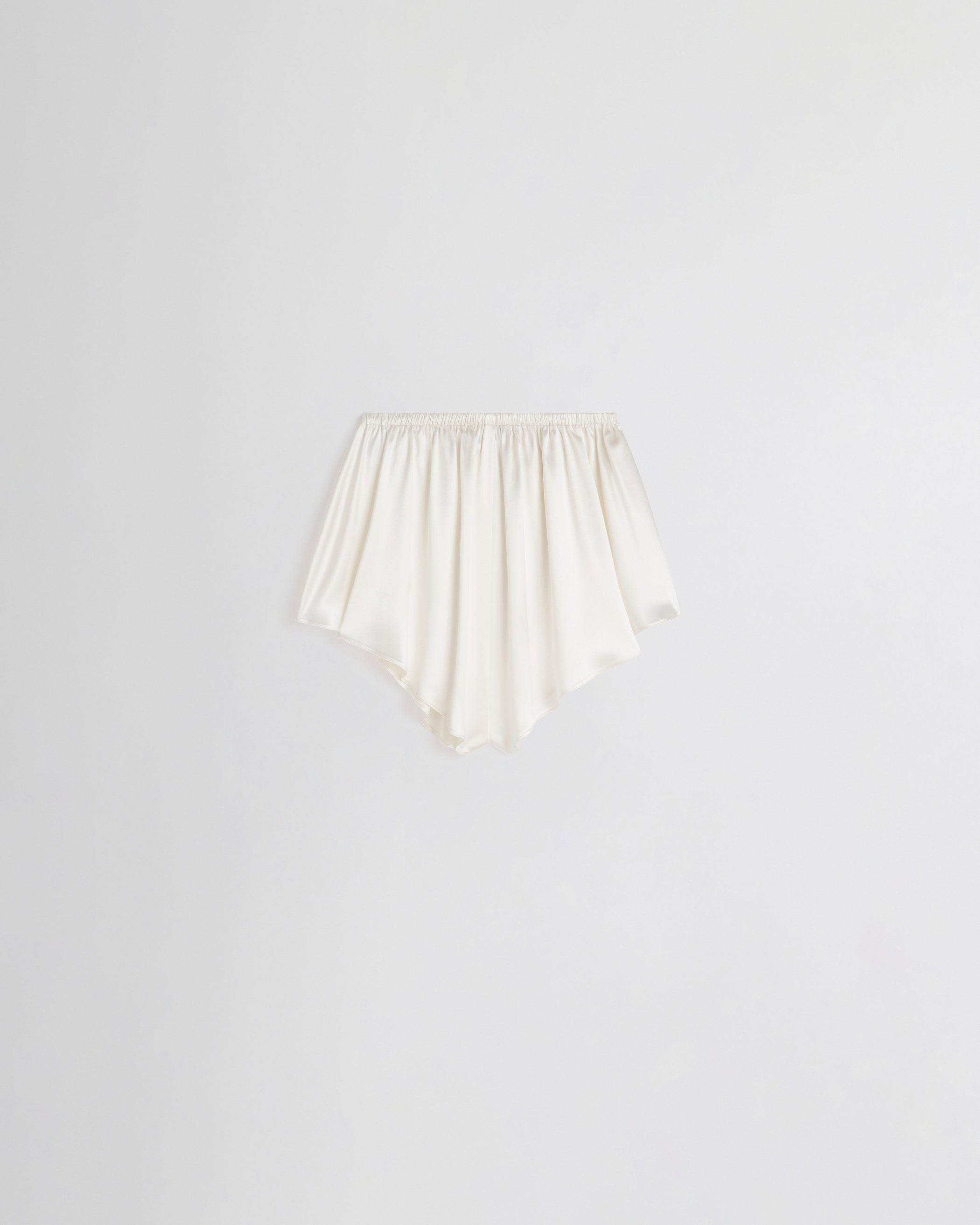 Flat back view LIQUID SHORTS in cream silk