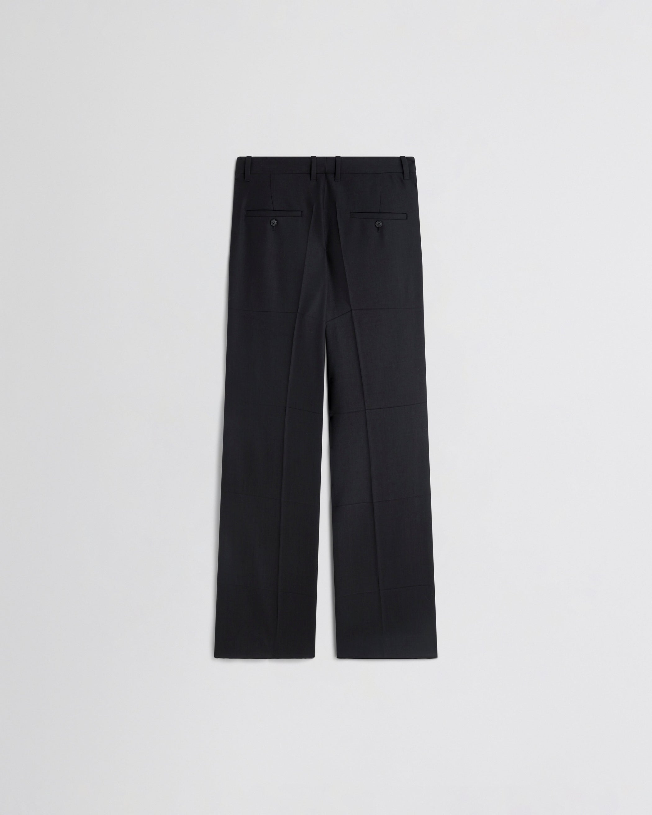 Flat back view of TUX BOYISH TROUSERS in black wool