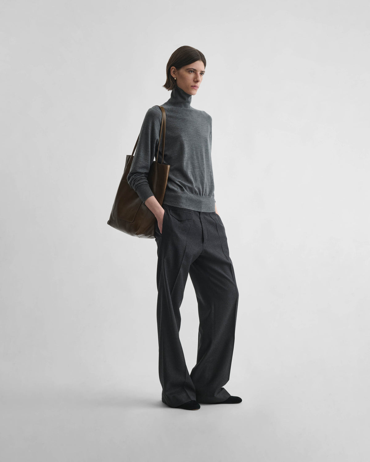 Front view of model wearing BOYISH TROUSERS in charcoal wool