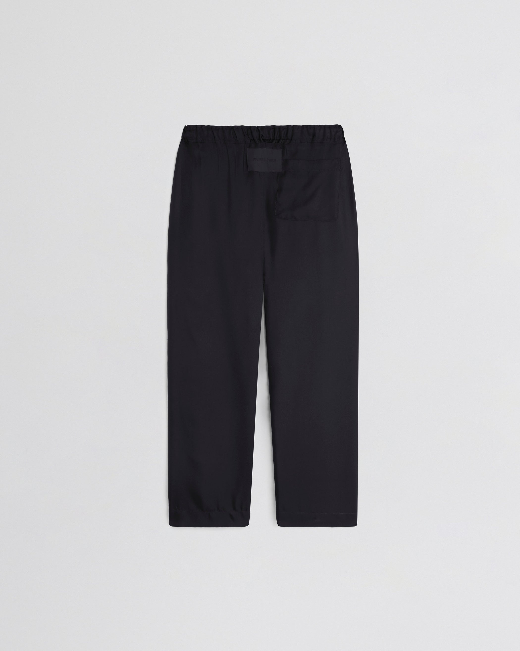 Flat back view of PYJAMA TROUSERS in black cotton