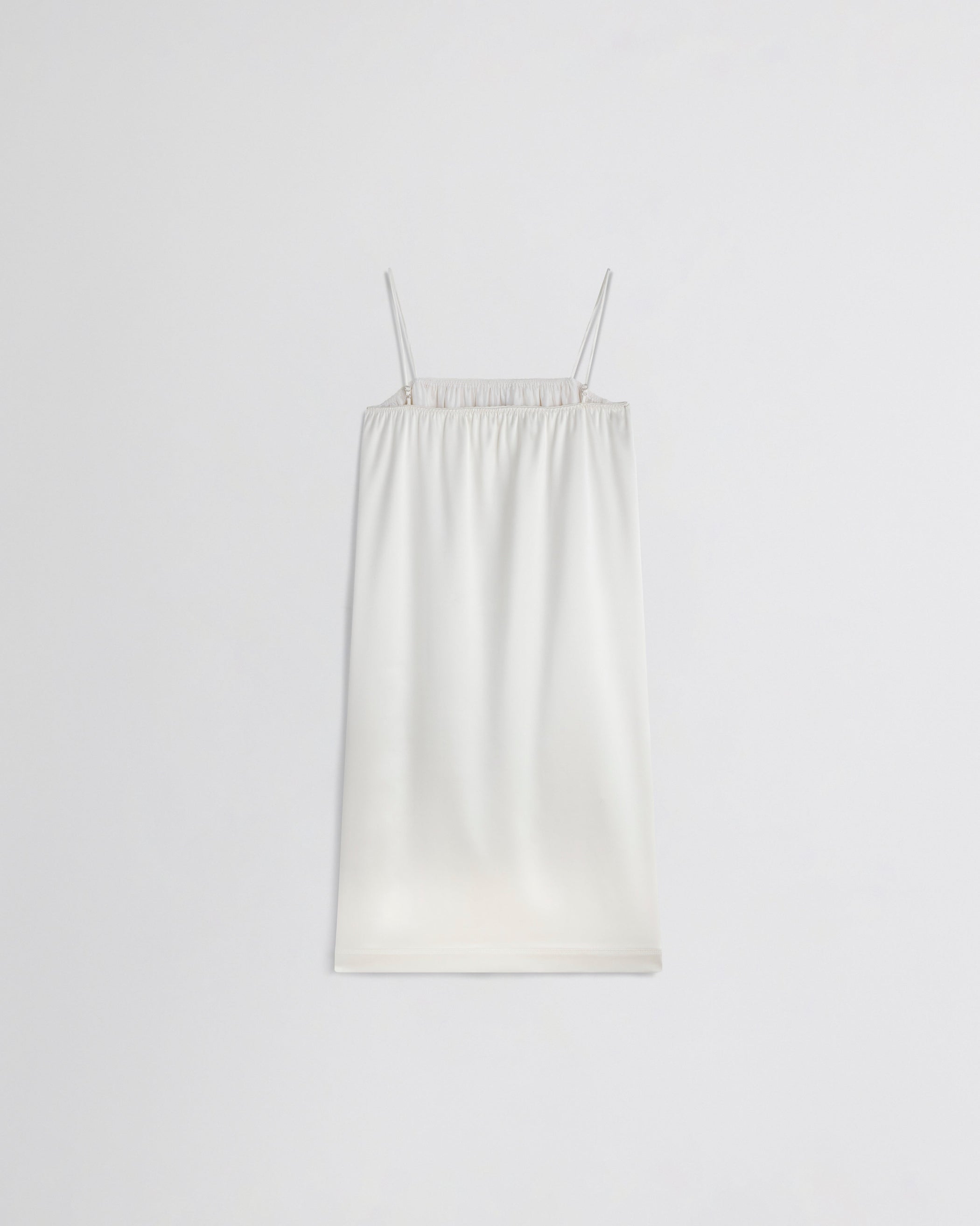 Flat back view of LIQUID SLIP DRESS in acid ivory silk