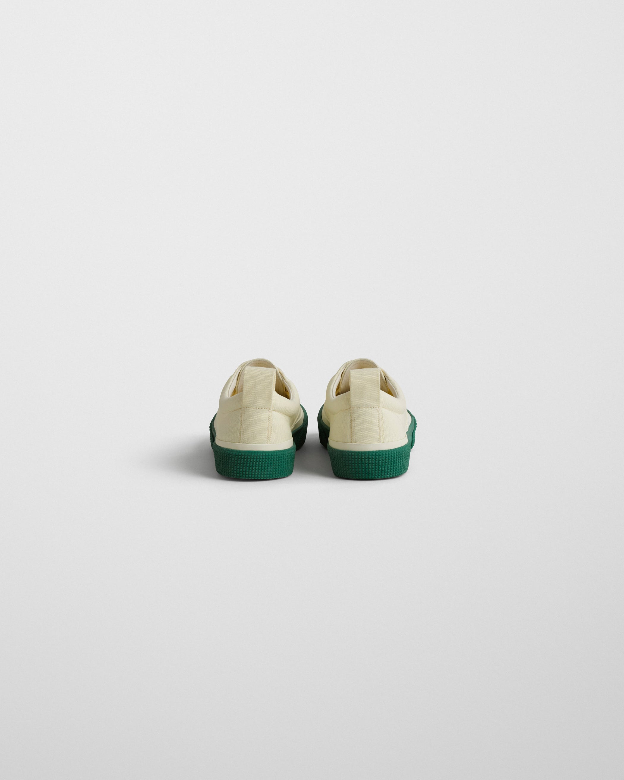 Back view of PLIMSOLE in soft yellow canvas