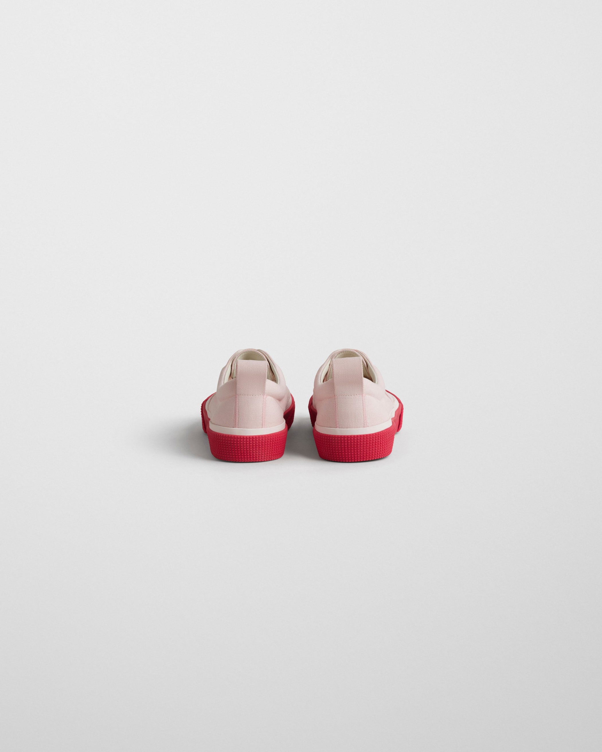 Back view of PLIMSOLE in soft pink canvas