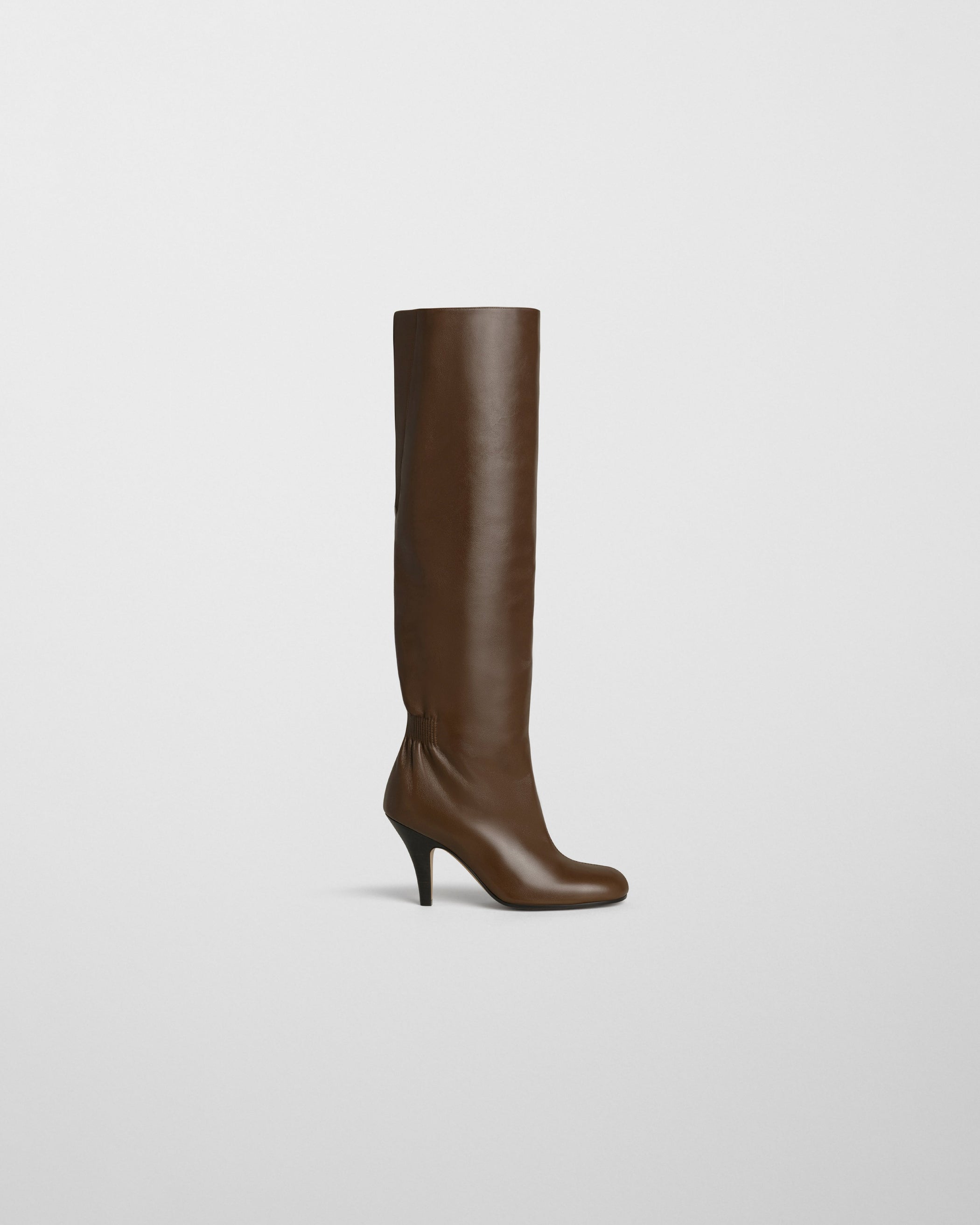 Side view of SLOUCHY HIGH BOOT in bronze leather