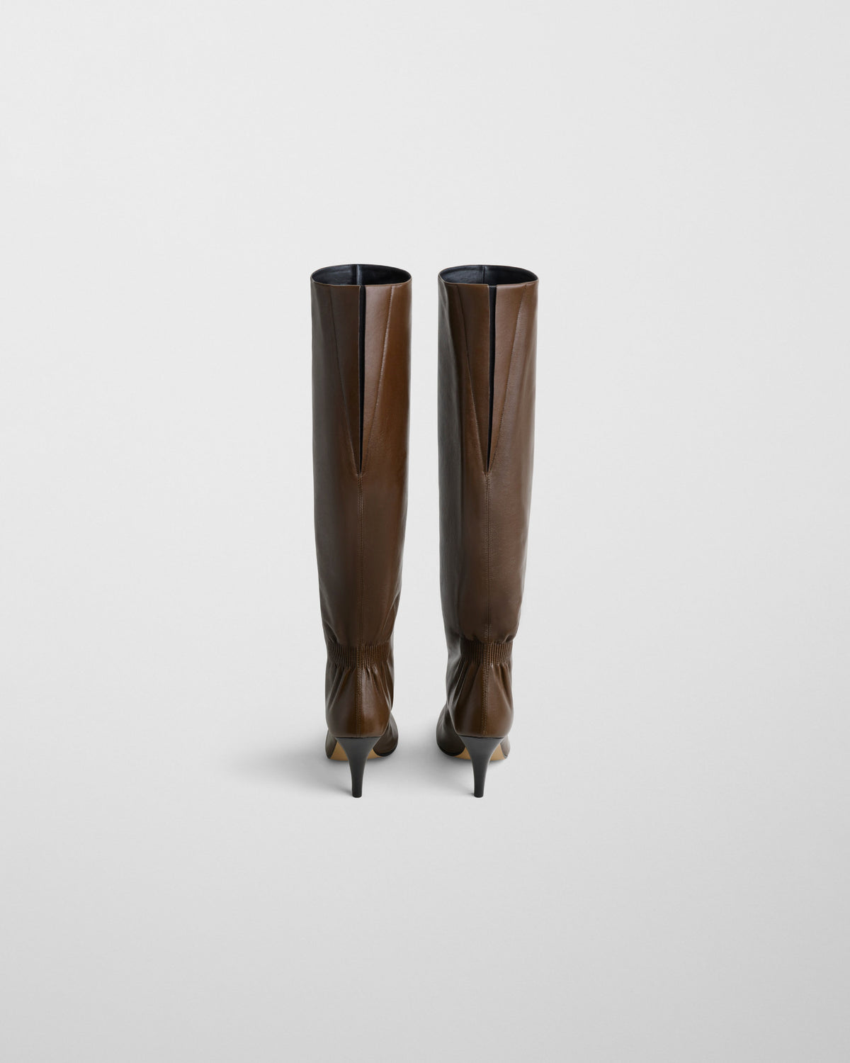 Back view of SLOUCHY HIGH BOOT in bronze leather